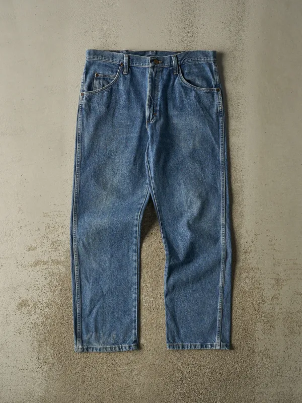 Vintage Y2K Mid Wash Wrangler Jeans (34x29) made by Rebalance Vintage
