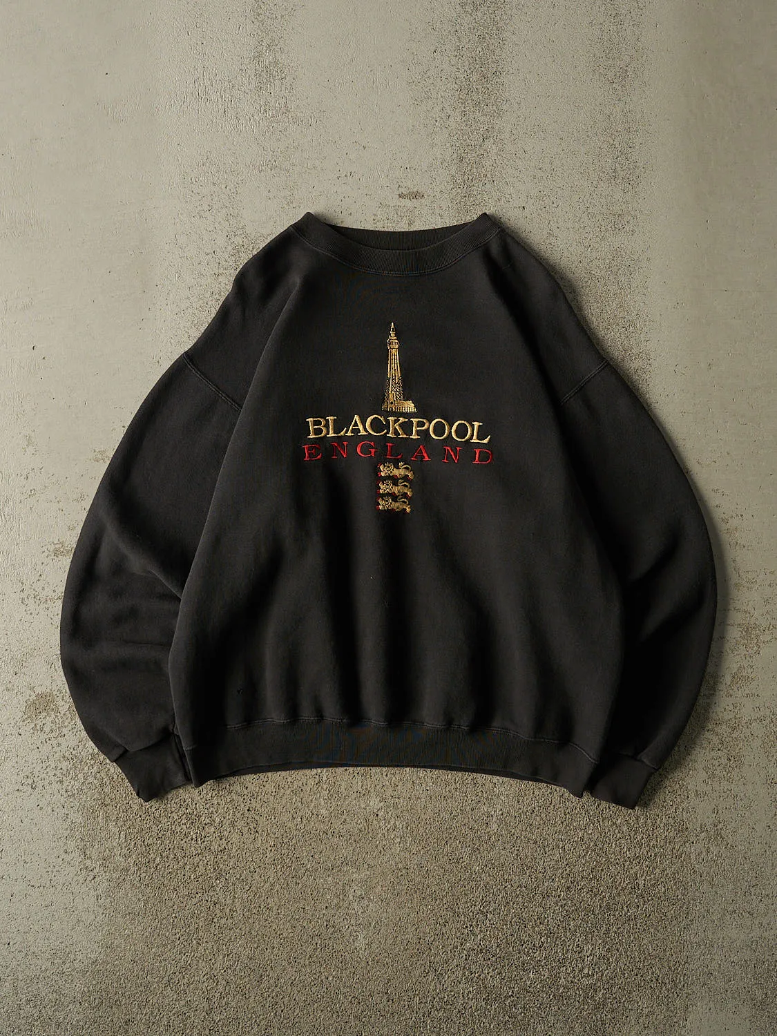 Vintage 90s RARE Faded Black Blackpool England Embroidered Crewneck (L) sold by Rebalance Vintage