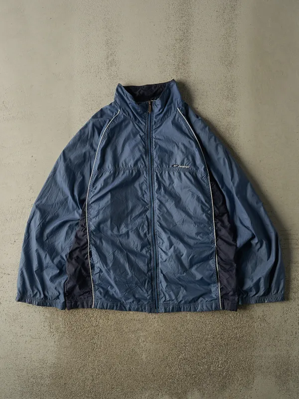 Vintage Y2K Blue Reebok Zip Up Windbreaker Jacket (XL/XXL) made by Rebalance Vintage