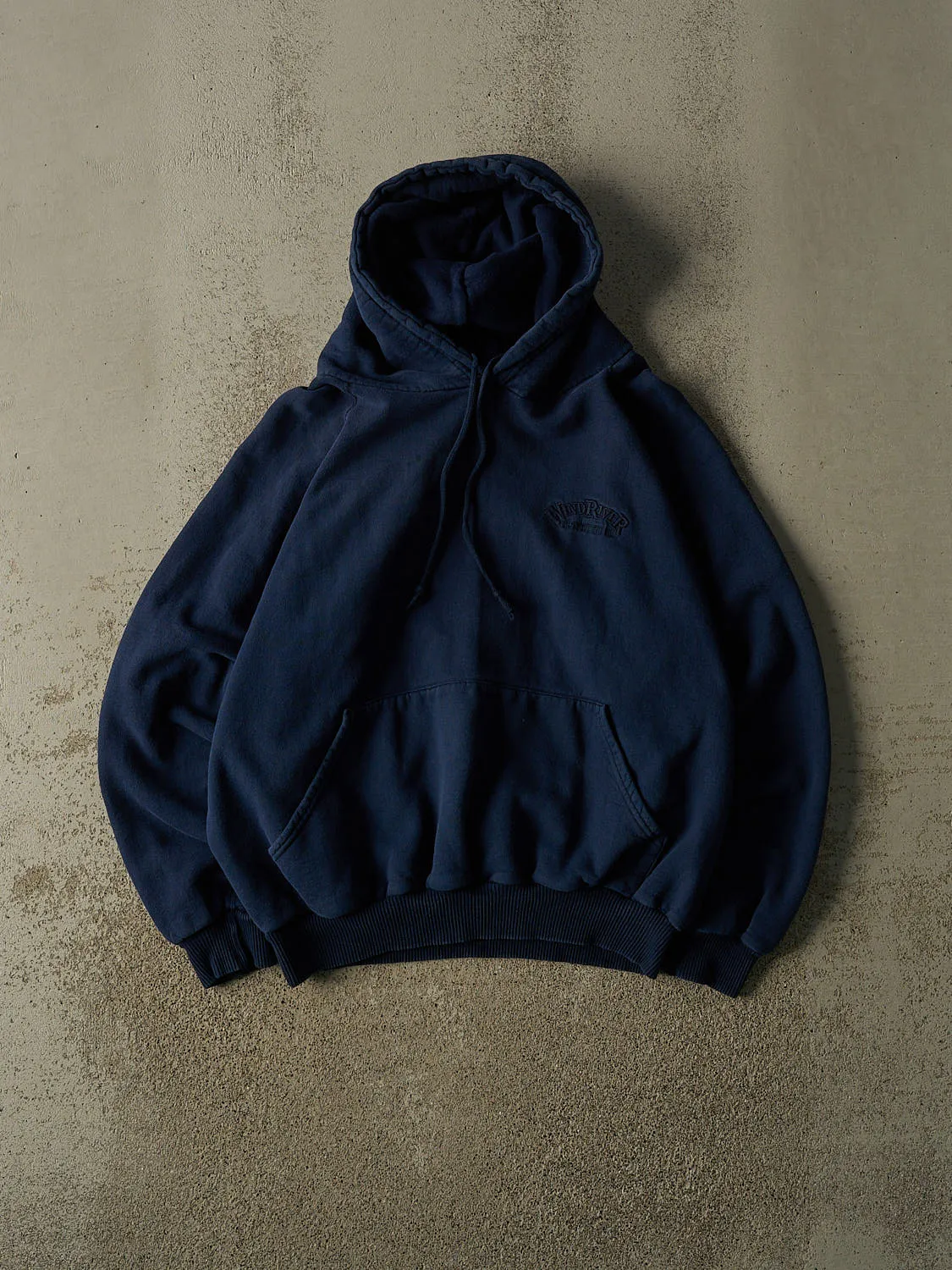 Vintage 90s Navy Blue Wind River Embroidered Hoodie (M/L) sold by Rebalance Vintage