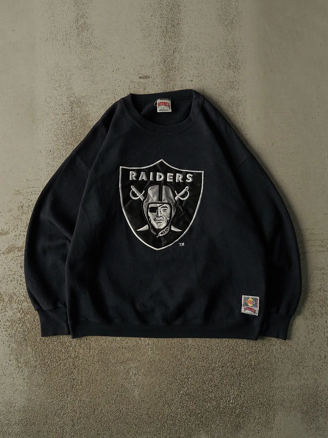 Vintage 90s Black Oakland Raiders Embroidered Crewneck (L/XL) sold by Rebalance Vintage