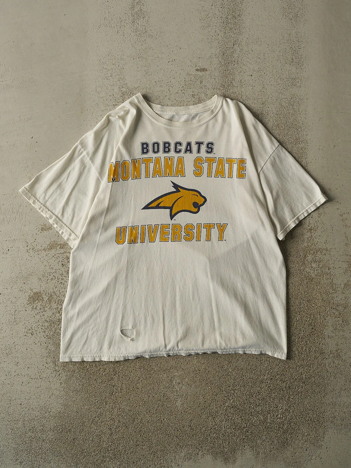 Vintage Y2K White Montana State University Bobcats Tee (L/XL) sold by Rebalance Vintage