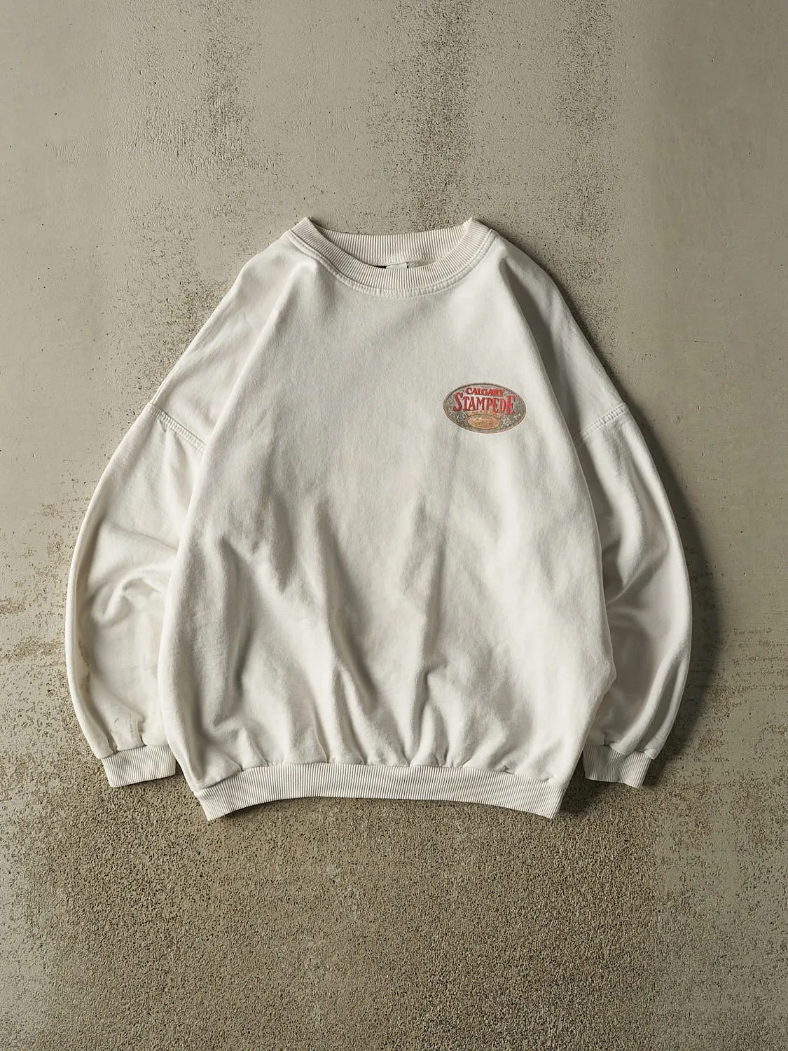 Vintage 90s White Calgary Stampede Crewneck (L) sold by Rebalance Vintage