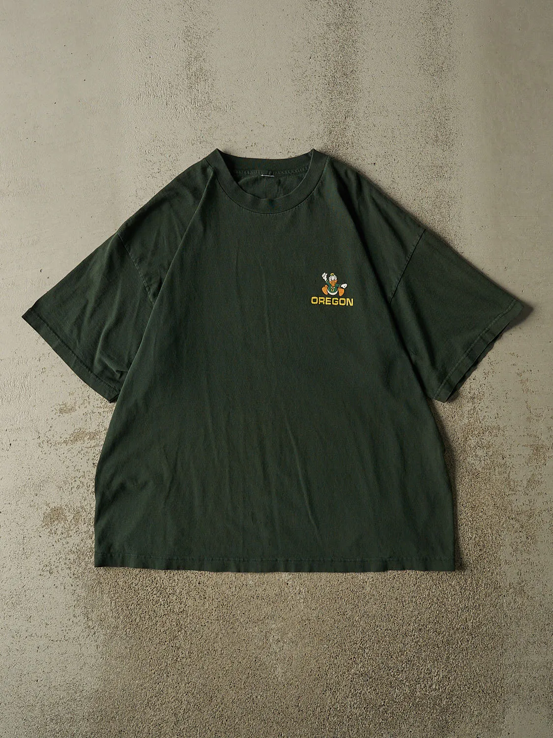 Vintage 90s Green University of Oregon Ducks Tee (XL) sold by Rebalance Vintage