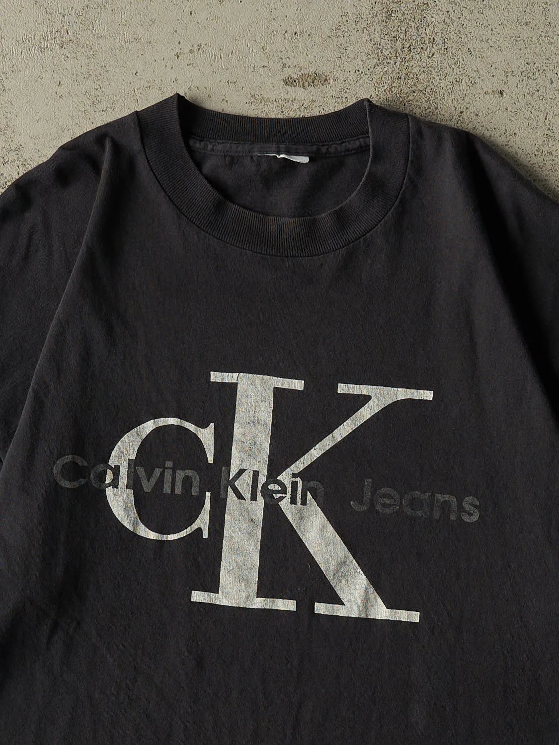 Vintage 90s Black Calvin Klein Jeans Single Stitch Tee (XL) sold by Rebalance Vintage product image thumbnail 2