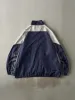 Vintage 90s Navy Blue & Grey Dallas Cowboys Windbreaker Jacket (XL) sold by Rebalance Vintage