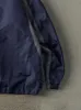 Vintage 90s Navy Blue & Grey Dallas Cowboys Windbreaker Jacket (XL) sold by Rebalance Vintage