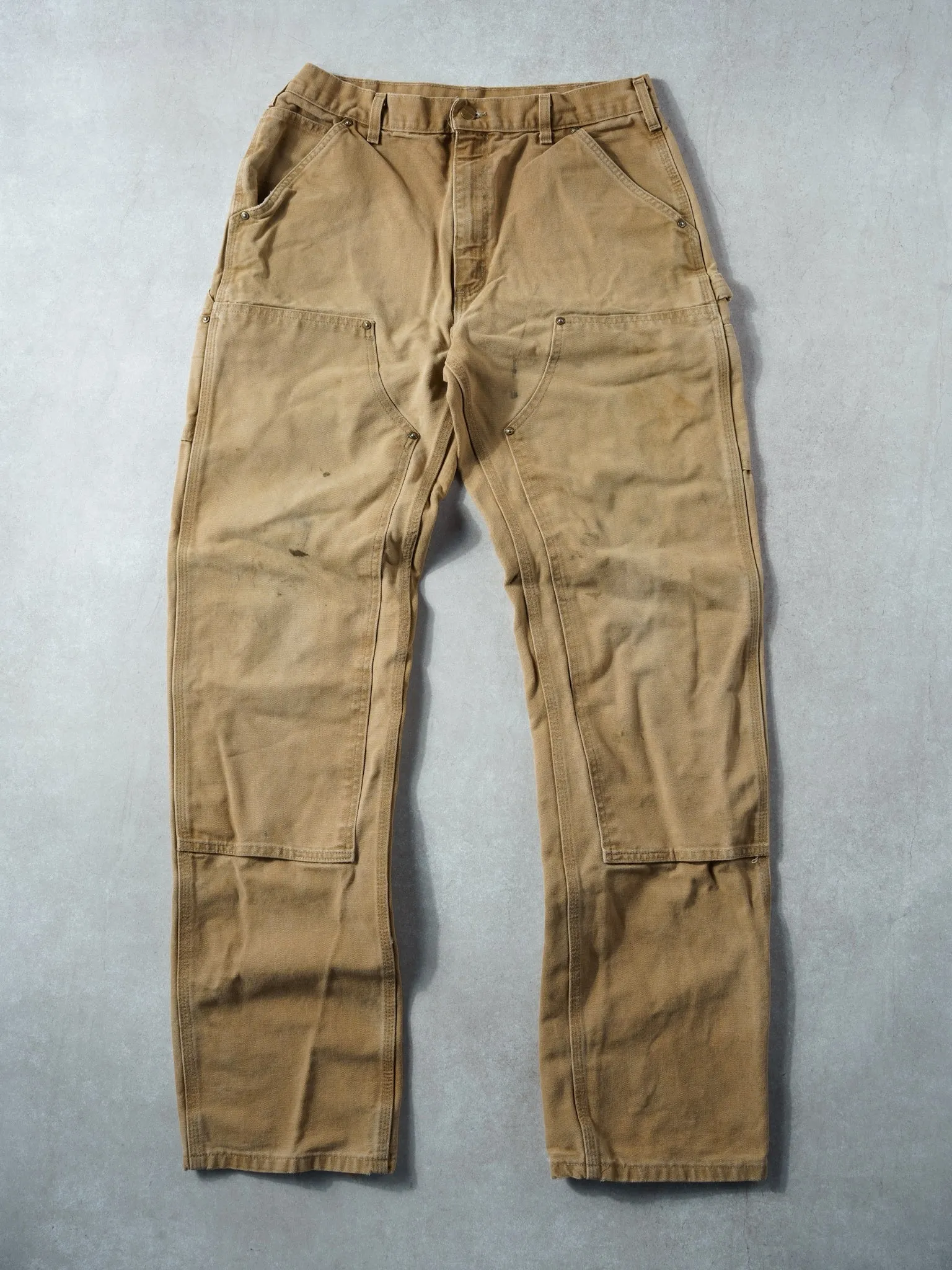 Vintage 90s Faded Khaki Dungeree Fit Carhartt Double Knee Carpenter Pants (34x35) sold by Rebalance Vintage
