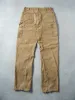 Vintage 90s Faded Khaki Dungeree Fit Carhartt Double Knee Carpenter Pants (34x35) sold by Rebalance Vintage