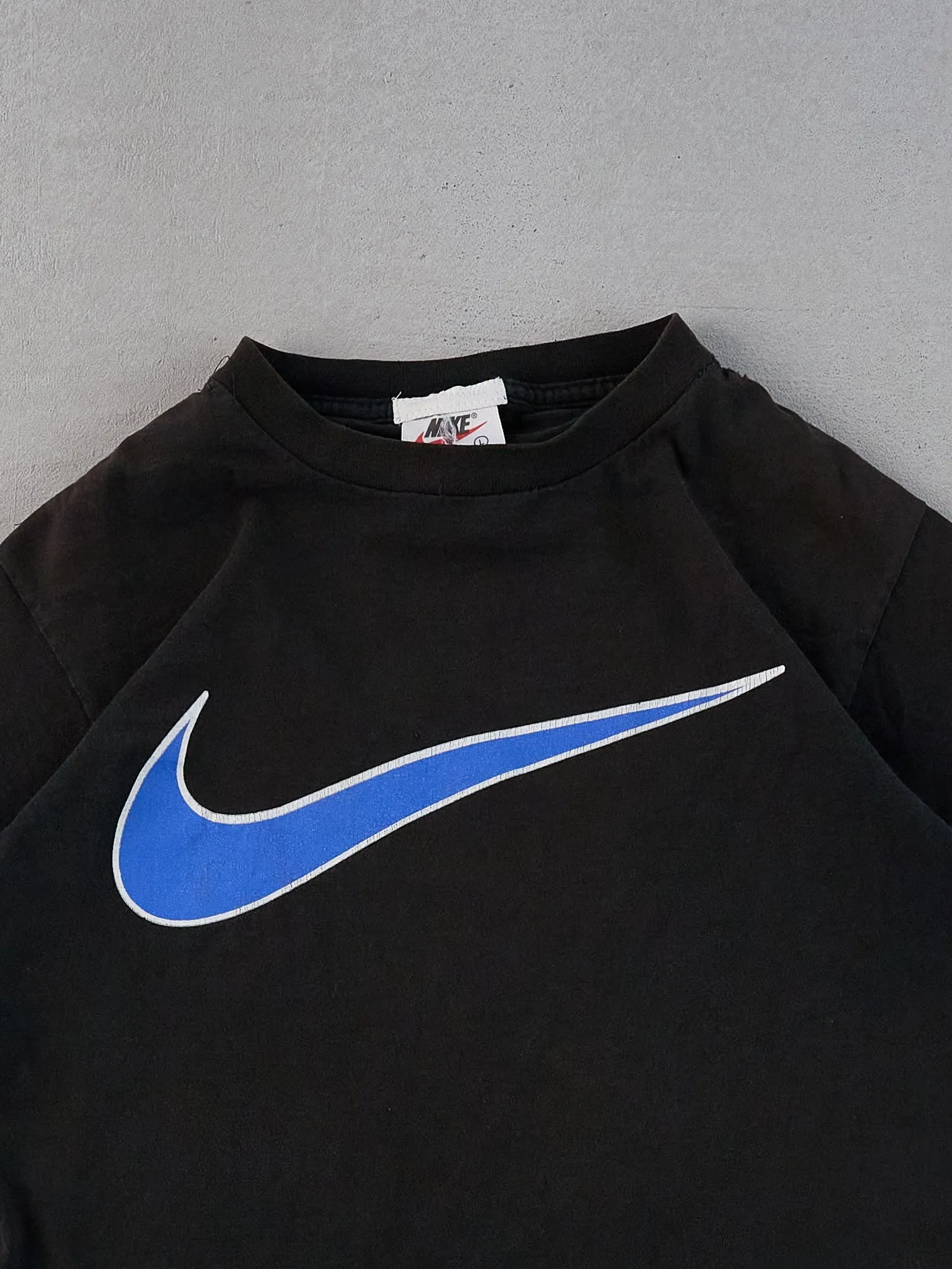 Vintage 90s Black and Blue Nike Swoosh Graphic Tee (S) sold by Rebalance Vintage product image thumbnail 2