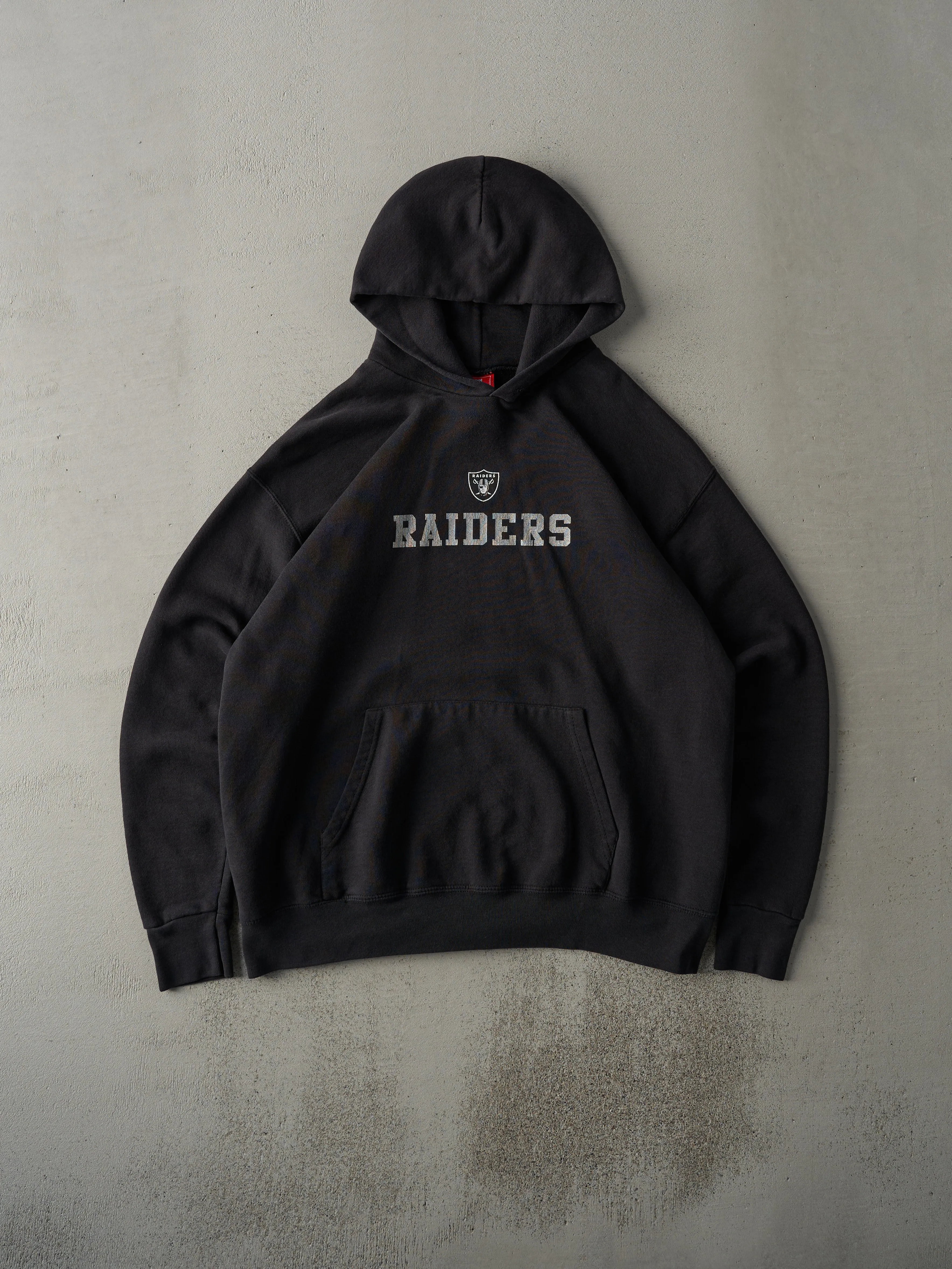 Vintage 90s Black Oakland Raiders Hoodie (L) sold by Rebalance Vintage