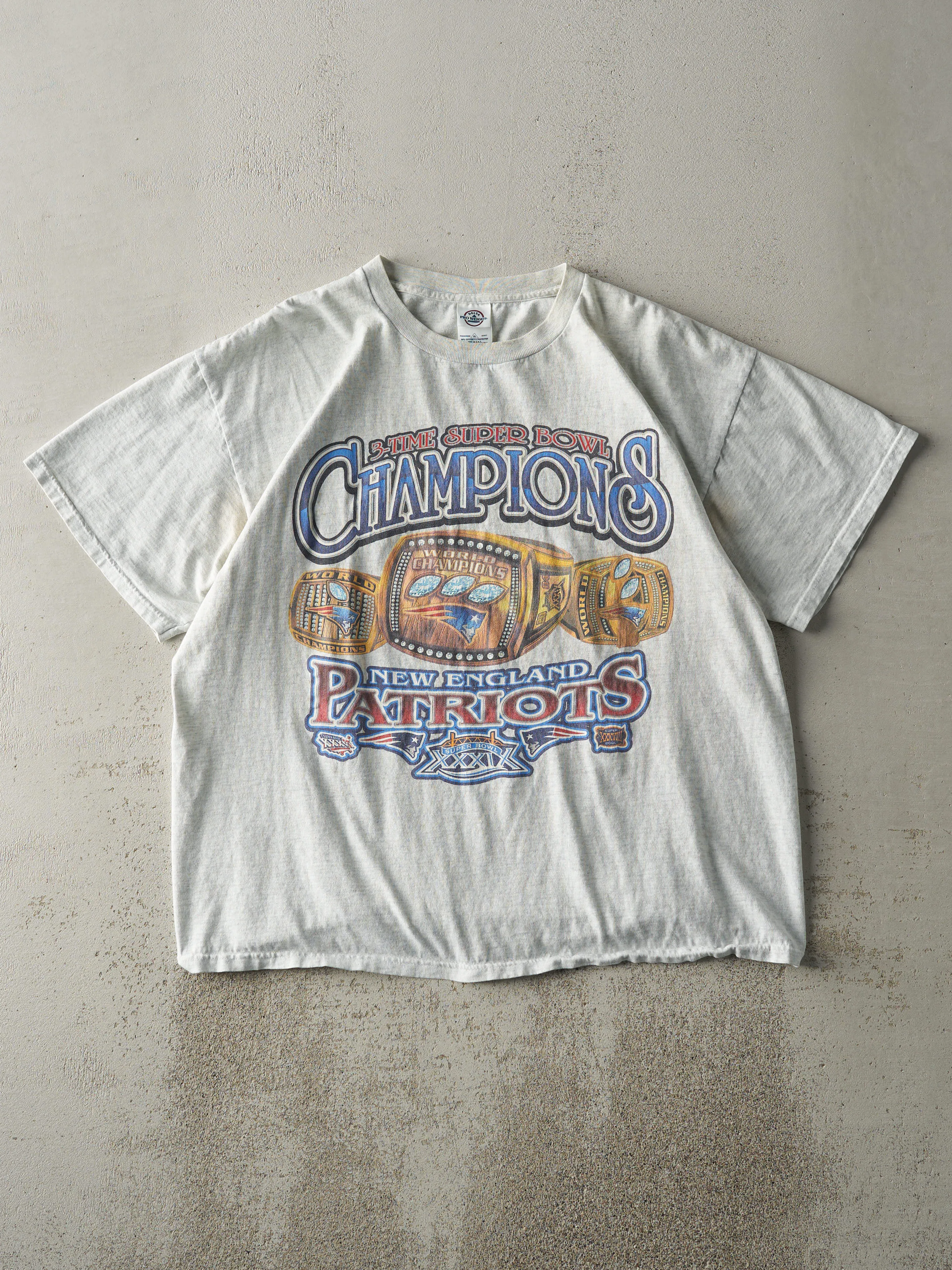 Vintage 05' Heather Grey New England Patriots Champions Tee (L) sold by Rebalance Vintage