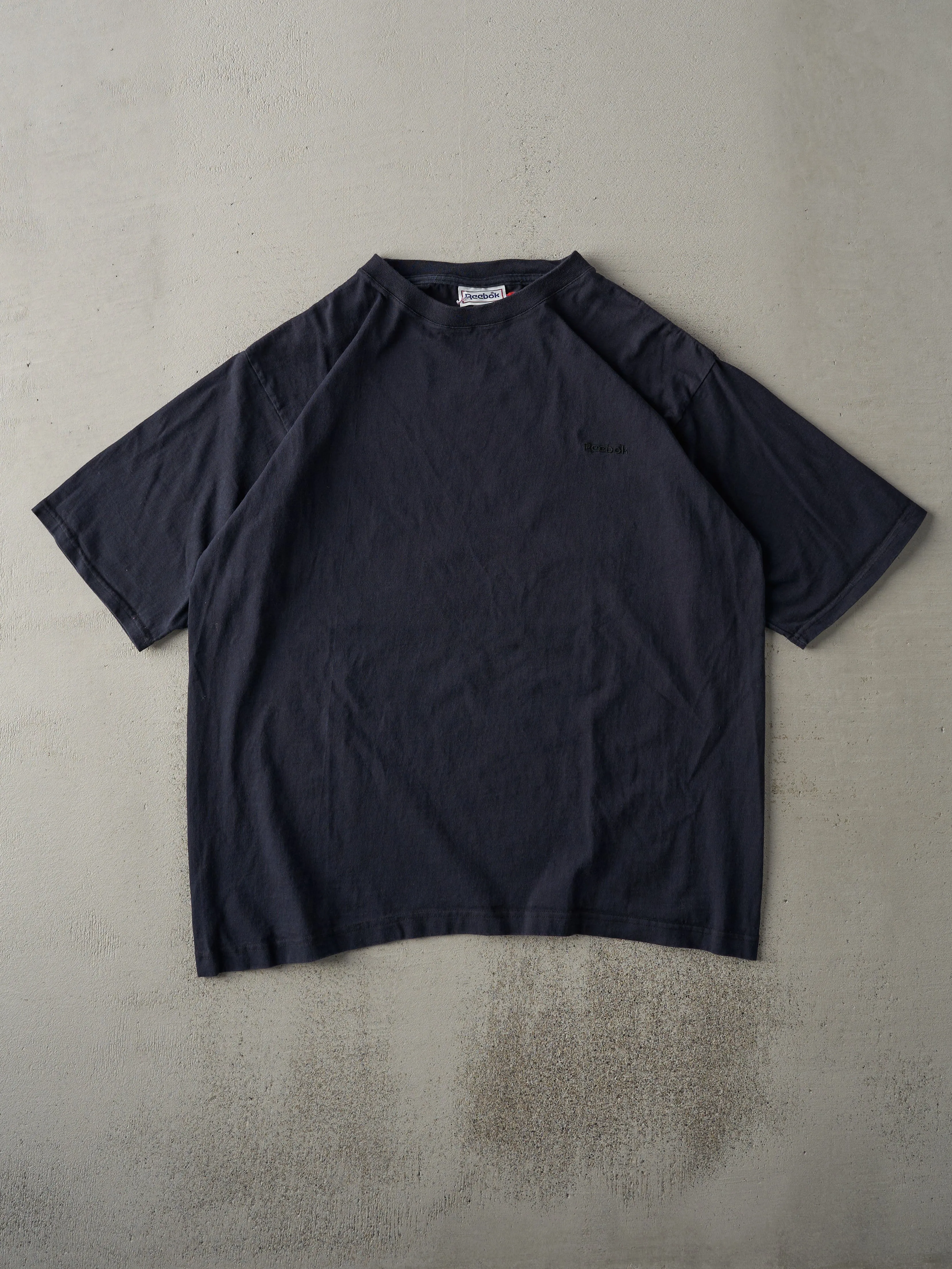 Vintage 90s Black Reebok Embroidered Blank Tee (L) sold by Rebalance Vintage