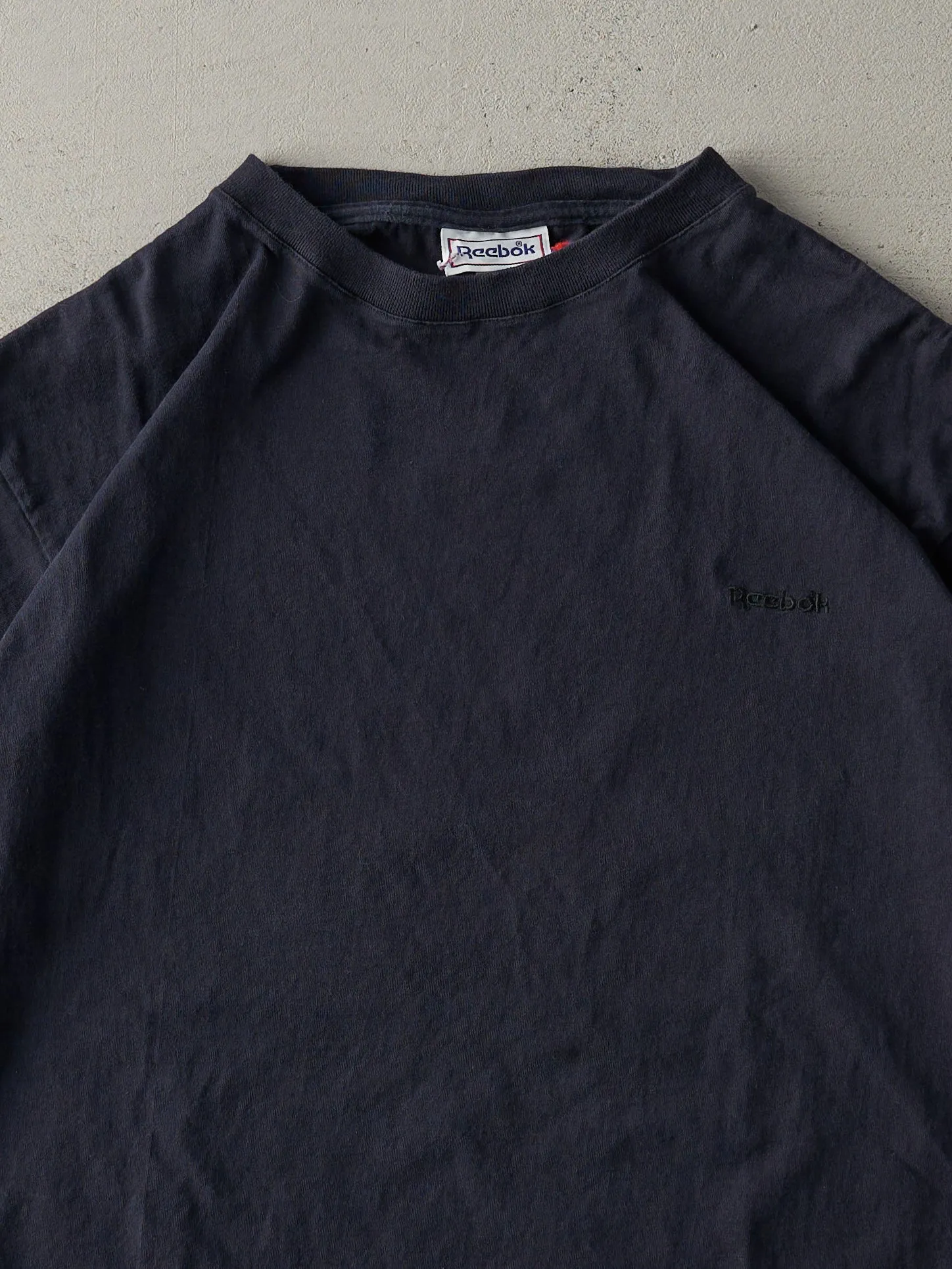 Vintage 90s Black Reebok Embroidered Blank Tee (L) sold by Rebalance Vintage product image thumbnail 2