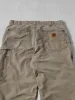 Vintage 90s Washed Brown Carhartt Carpenter Pants (32x29) sold by Rebalance Vintage