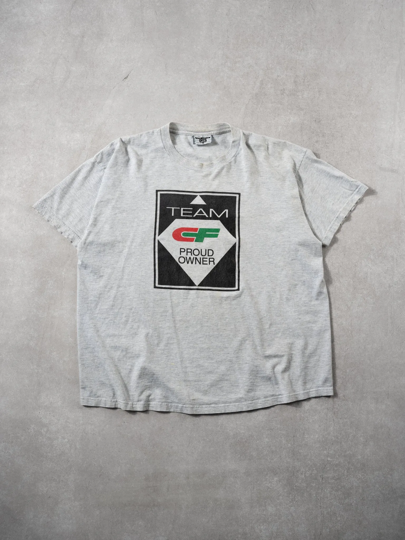 Vintage 90s Grey Team CF Tee (L) sold by Rebalance Vintage