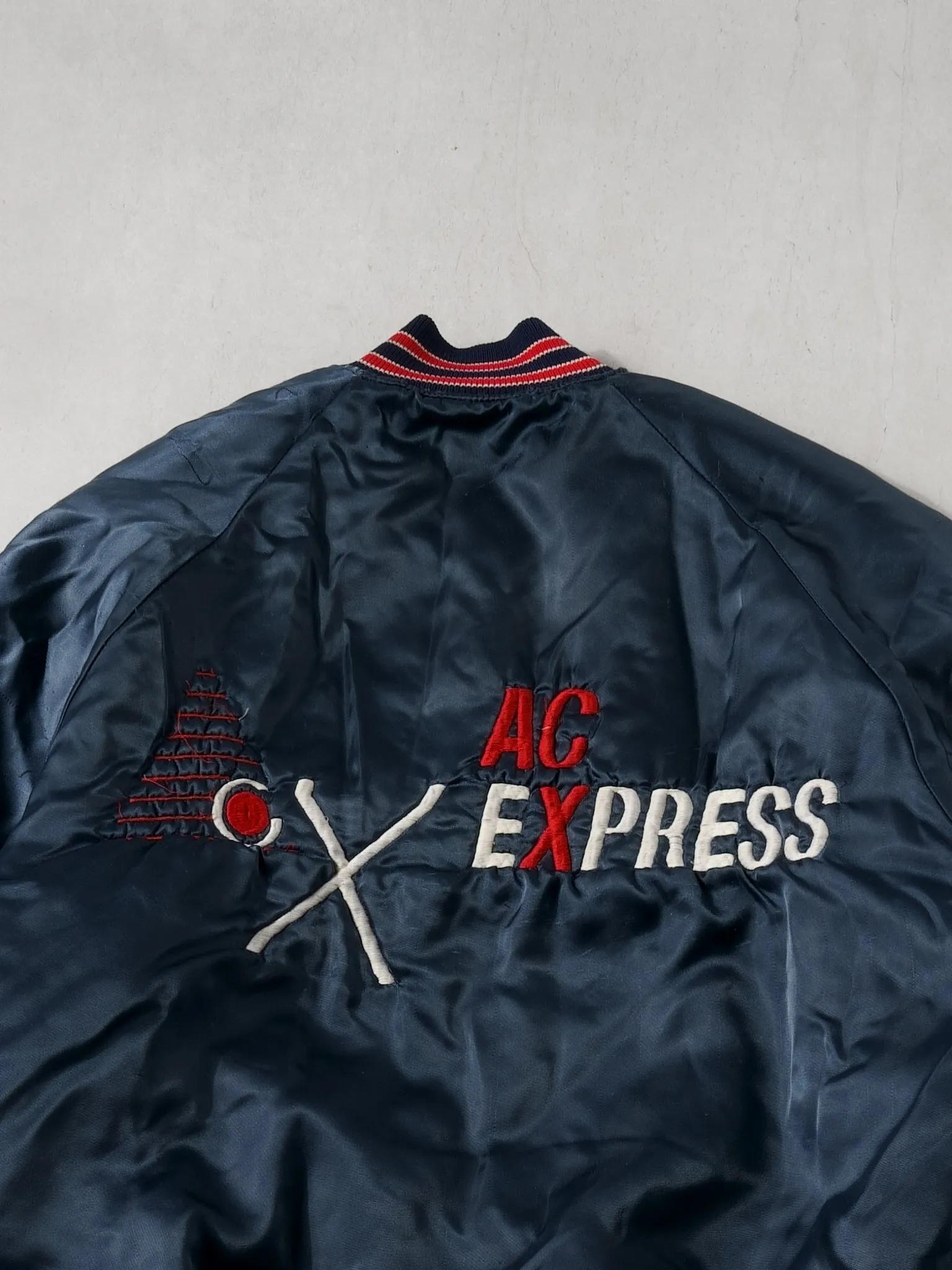 Vintabe 90s Navy Blue and Red AC Express Bomber Jacket (L) sold by Rebalance Vintage product image thumbnail 5
