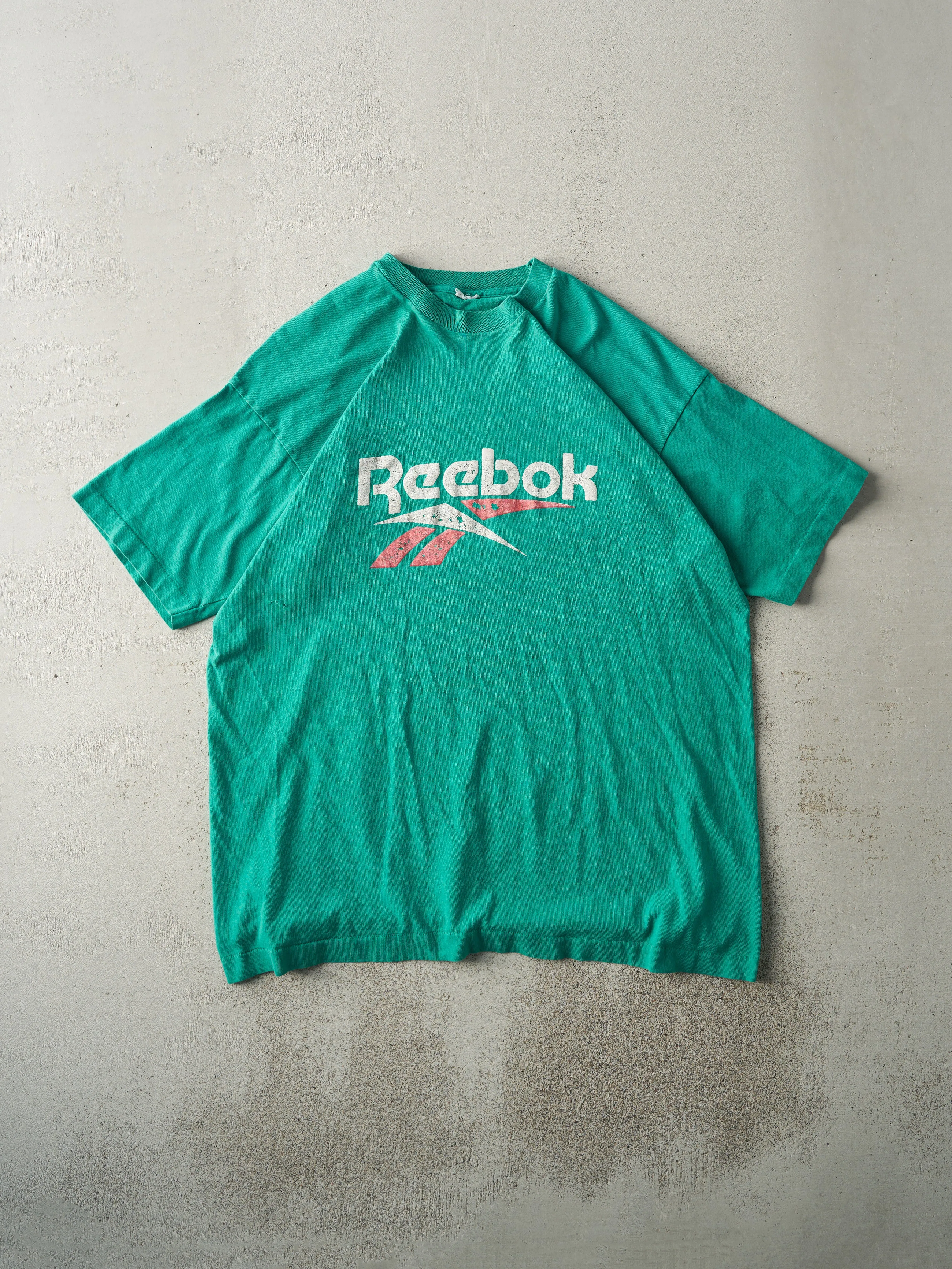 Vintage 90s Green Reebok Logo Single Stitch Tee (L) sold by Rebalance Vintage