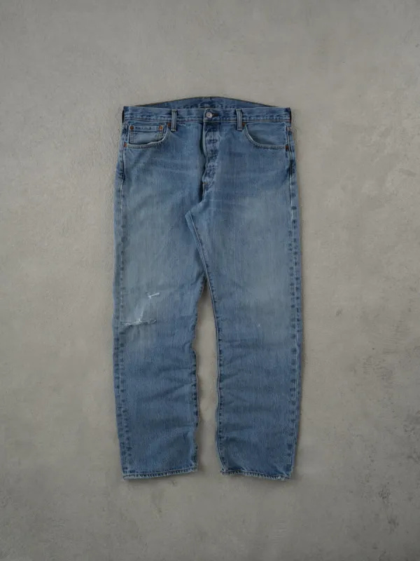 Vintage 90s Light Washed Blue Levi's 501 Denim Jeans (36x30) sold by Rebalance Vintage