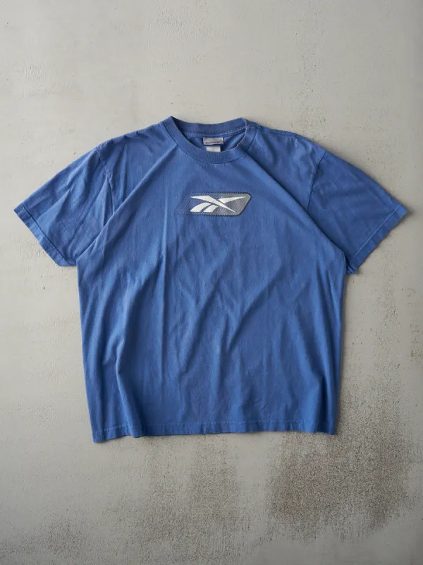 Vintage 90s Washed Blue Reebok Logo Tee (L) sold by Rebalance Vintage