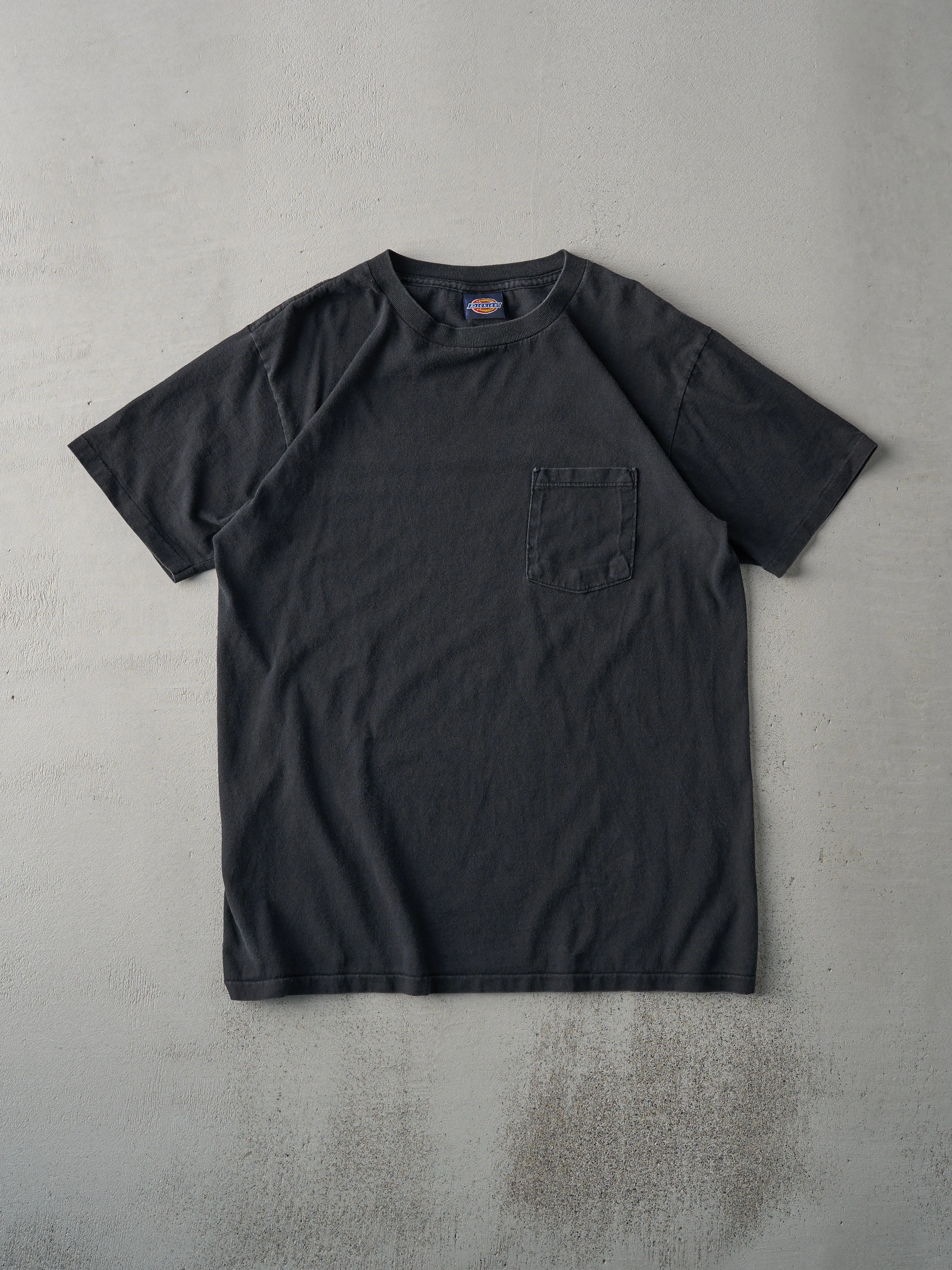 Vintage 90s Faded Black Blank Dickies Single Stitch Pocket Tee (M) sold by Rebalance Vintage