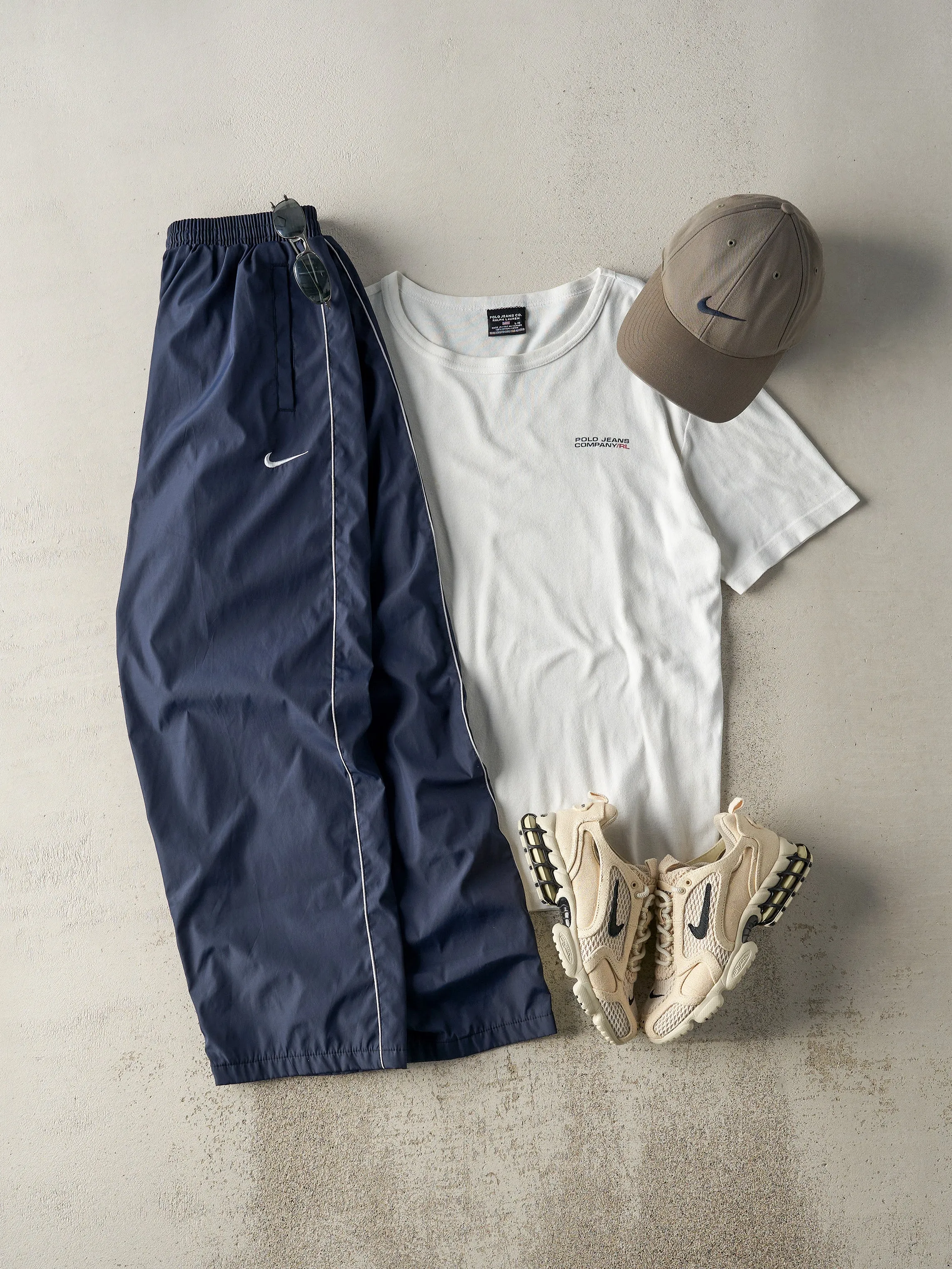 Vintage Y2K Navy Blue & White Nike Embroidered Track Pants (27x26.5) sold by Rebalance Vintage product image thumbnail 2