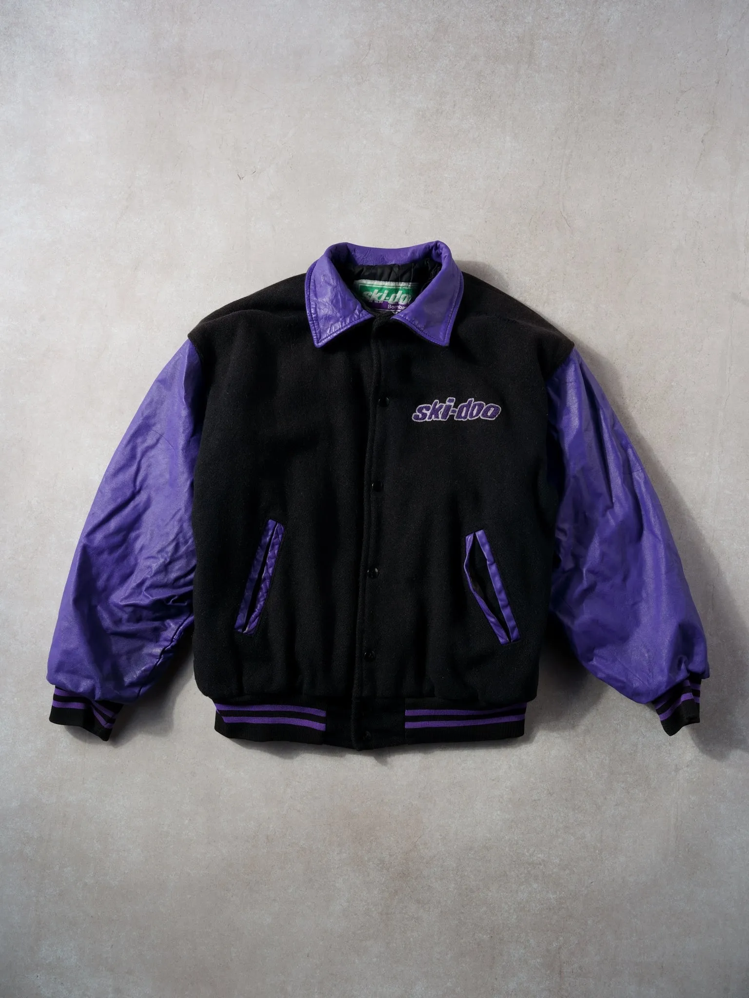 Vintage 90s Black and Purple Skii-Do Bomber Jacket (L) sold by Rebalance Vintage