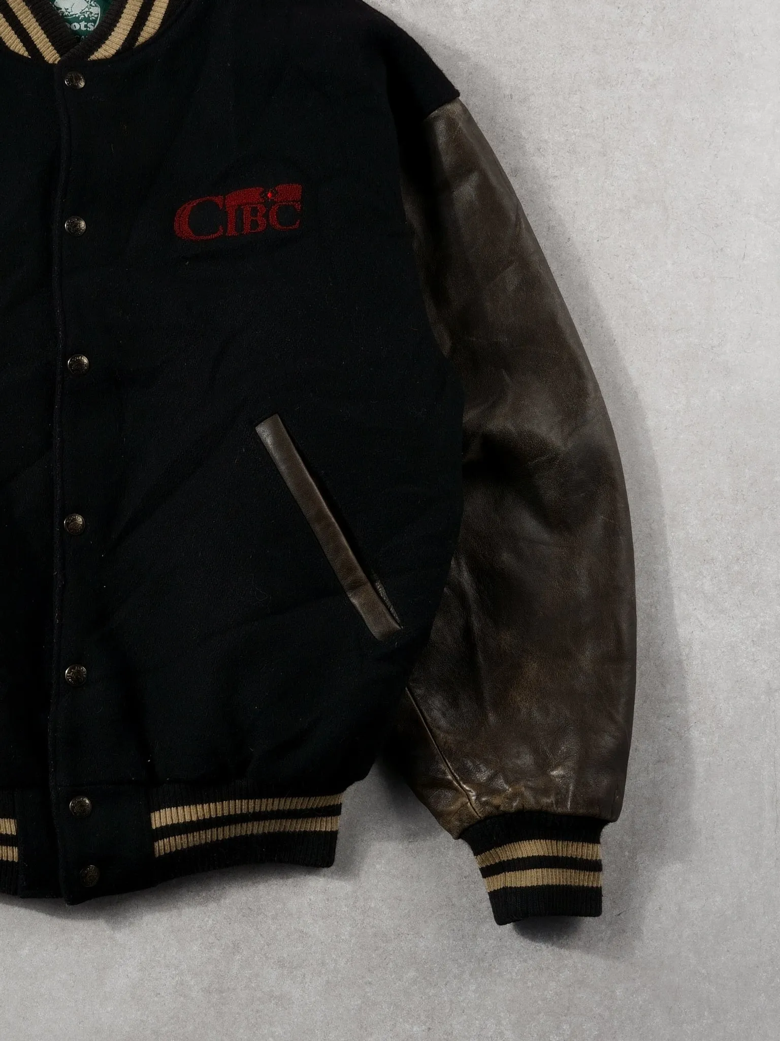 Vintage 90s Black and Brown Roots x CIBC Varsity Jacket (M) sold by Rebalance Vintage product image thumbnail 3
