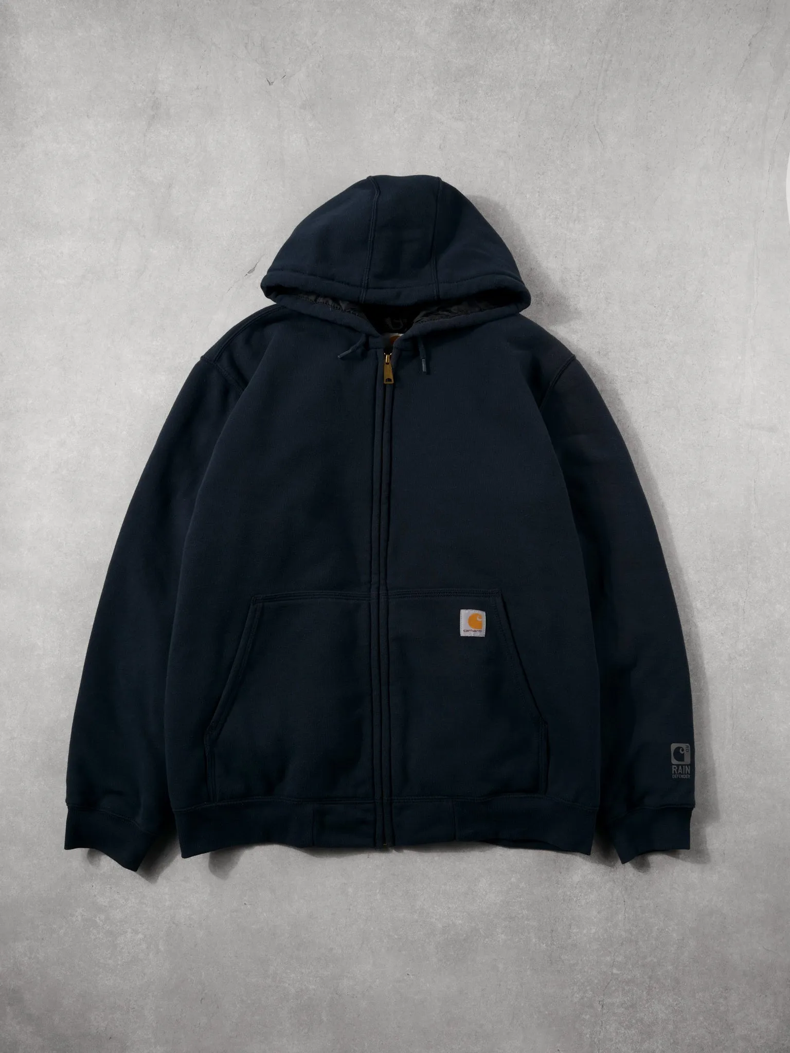 Vintage 90s Navy Blue Carhartt Rain Defender Hooded Jacket (XL) sold by Rebalance Vintage