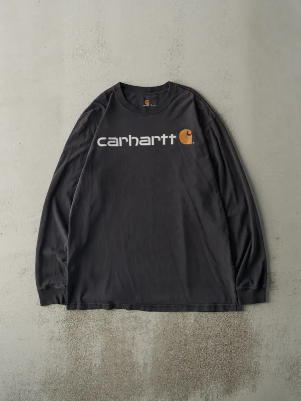 Vintage Y2K Faded Black Carhartt Long Sleeve (L/XL) sold by Rebalance Vintage