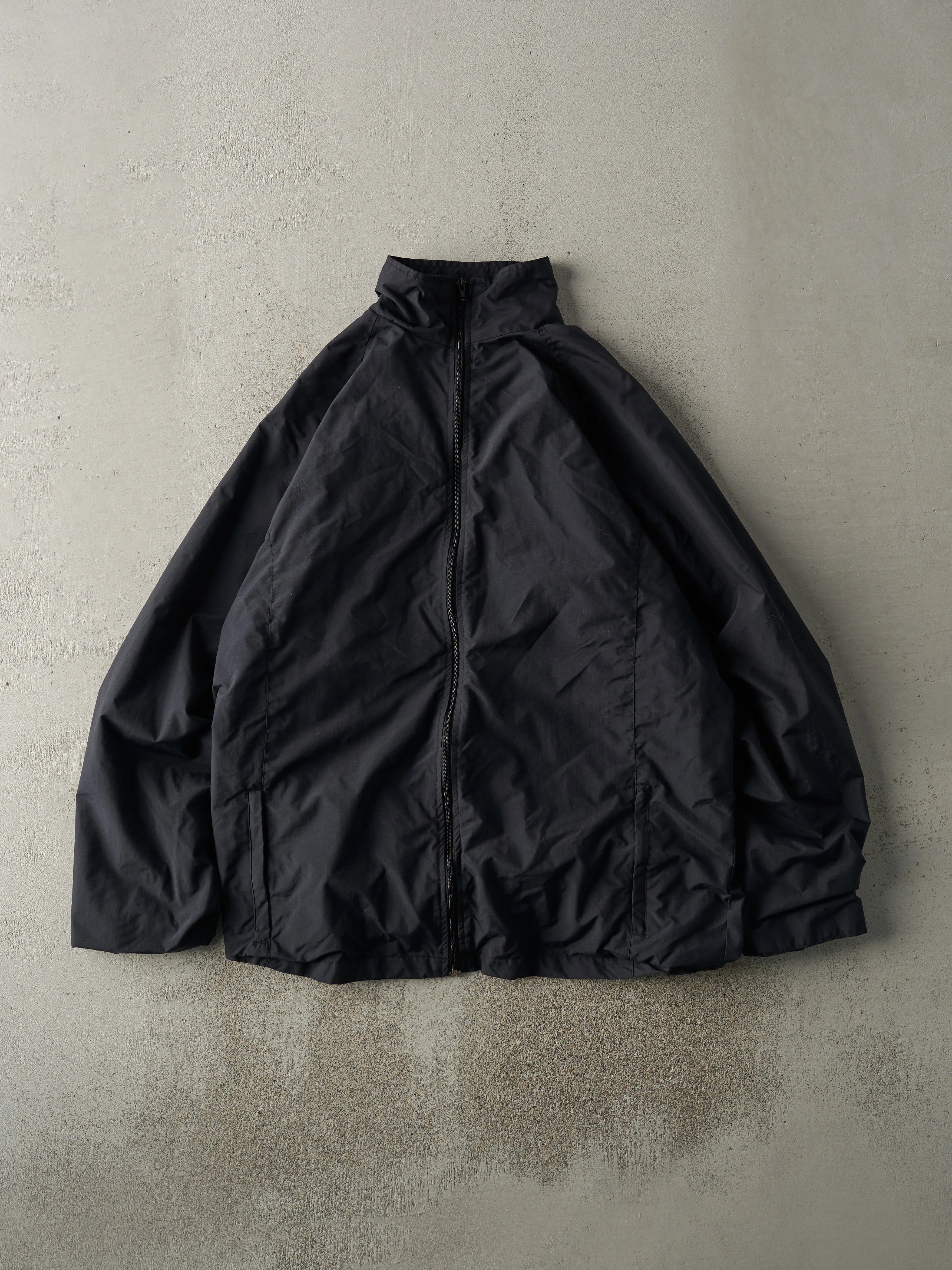Vintage Y2K Black Russell Athletic Black Zip Up Windbreaker Jacket (L/XL) sold by Rebalance Vintage
