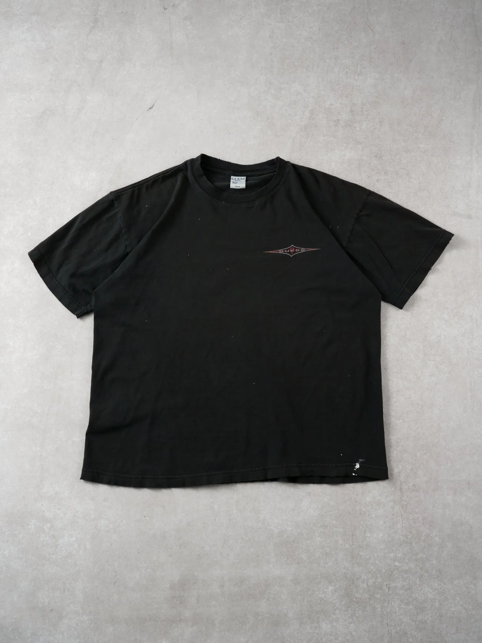 Vintage 90s Washed Black Guess USA Tee (M) sold by Rebalance Vintage