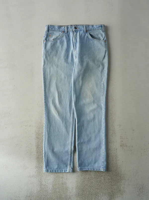 Vintage 80s Light Wash Levi's 619 Orange Tab Jeans (34x30) sold by Rebalance Vintage