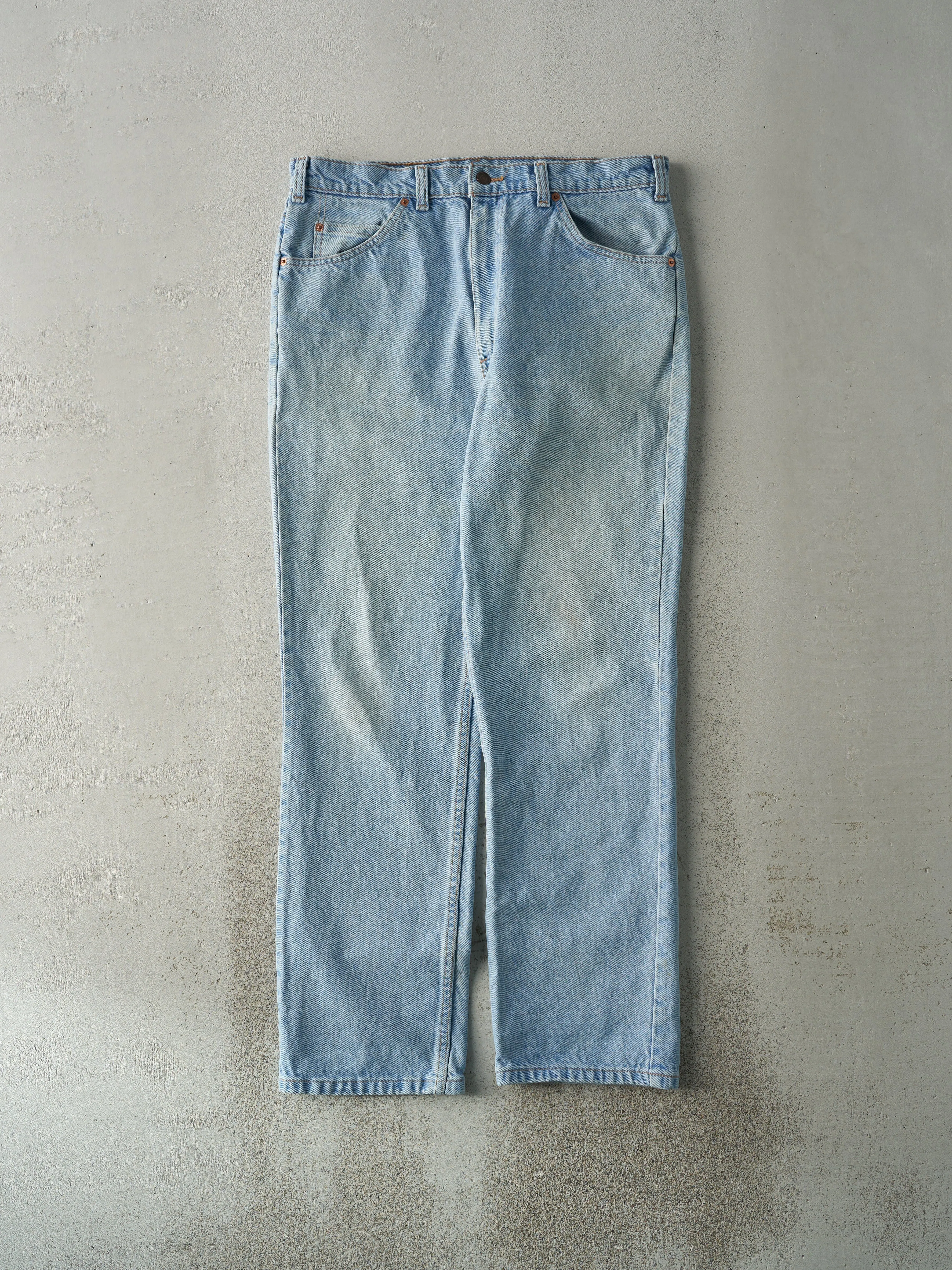 Vintage 80s Light Wash Levi's 619 Orange Tab Jeans (34x30) sold by Rebalance Vintage