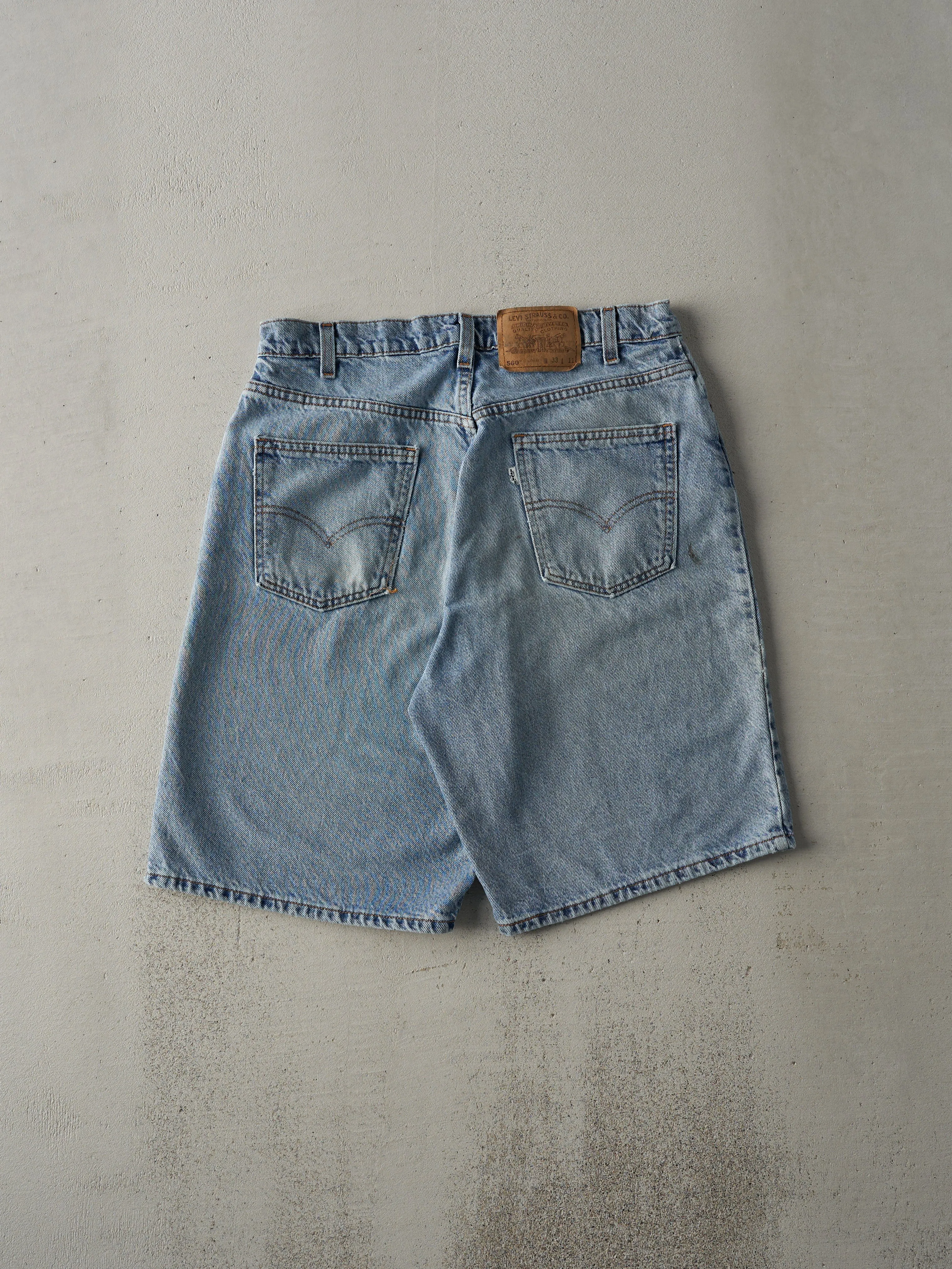 Vintage 80s Light Wash Levi's 560 Loose Fit White Tab Jean Shorts (33x10) sold by Rebalance Vintage product image thumbnail 3