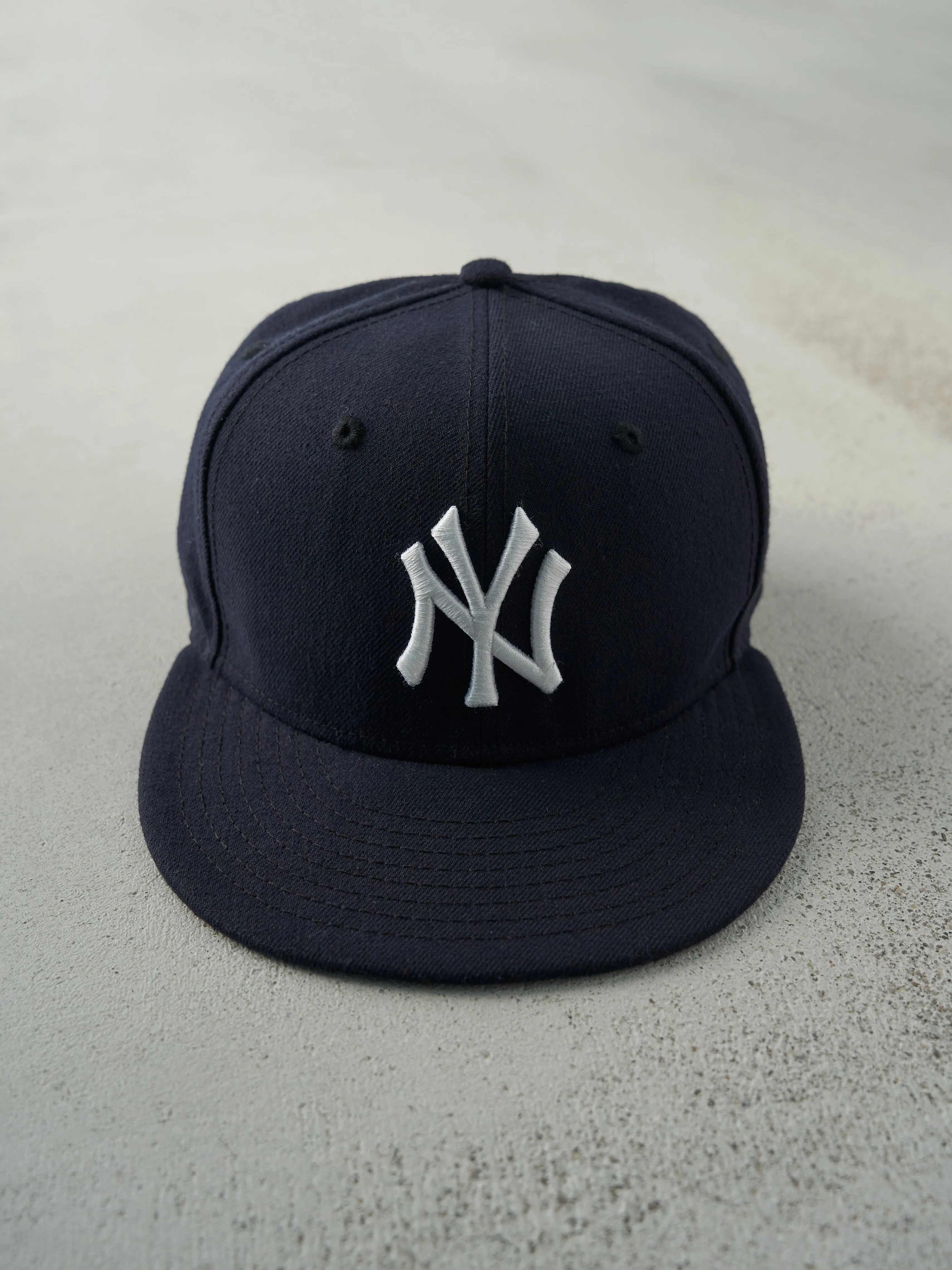 Vintage Y2K Navy Blue 59Fifty Embroidered New York Yankees Fitted Hat (7 1/8) sold by Rebalance Vintage
