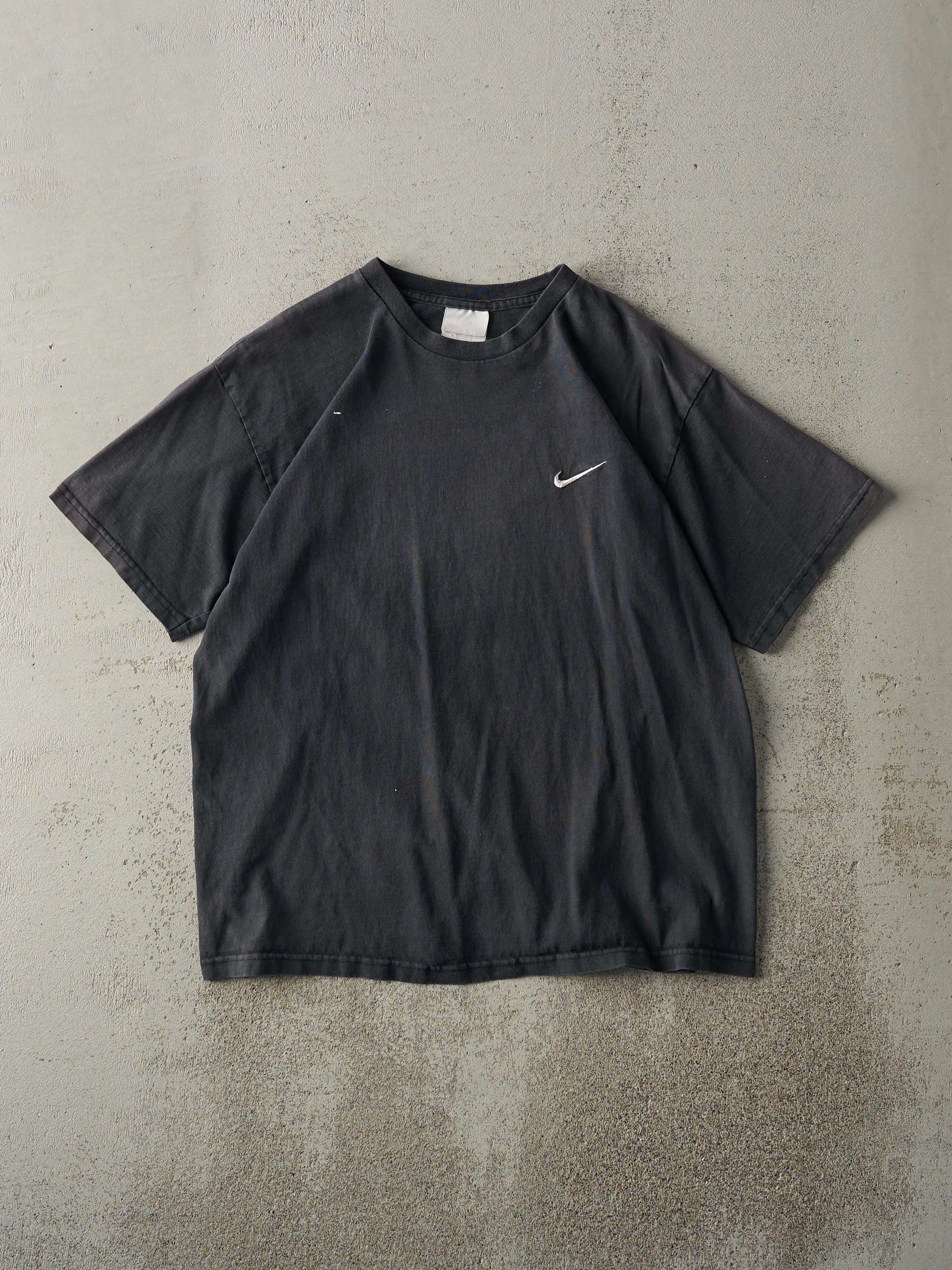 Vintage 90s Faded Black Embroidered Nike Swoosh Tee (M) sold by Rebalance Vintage
