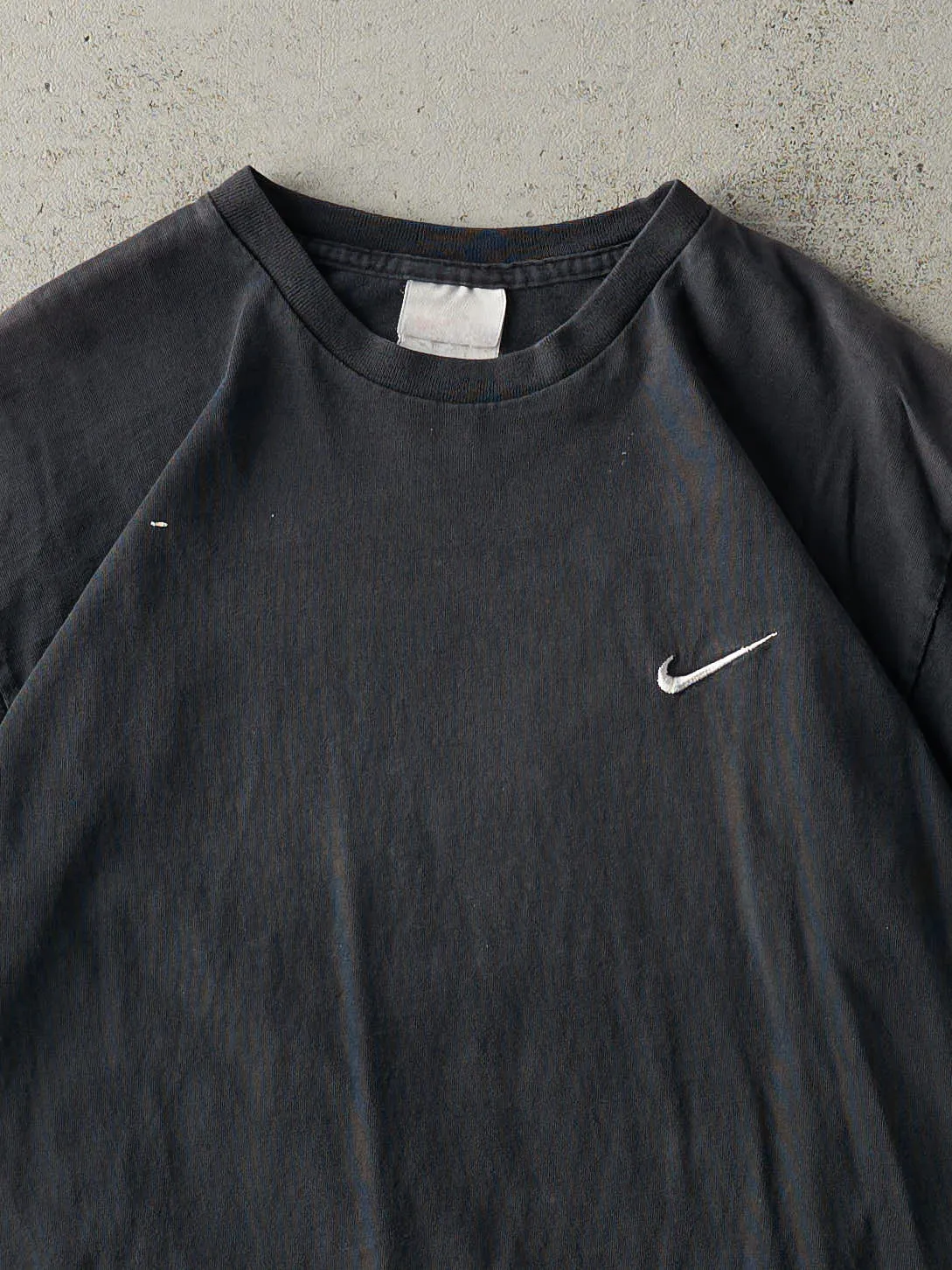 Vintage 90s Faded Black Embroidered Nike Swoosh Tee (M) sold by Rebalance Vintage product image thumbnail 2