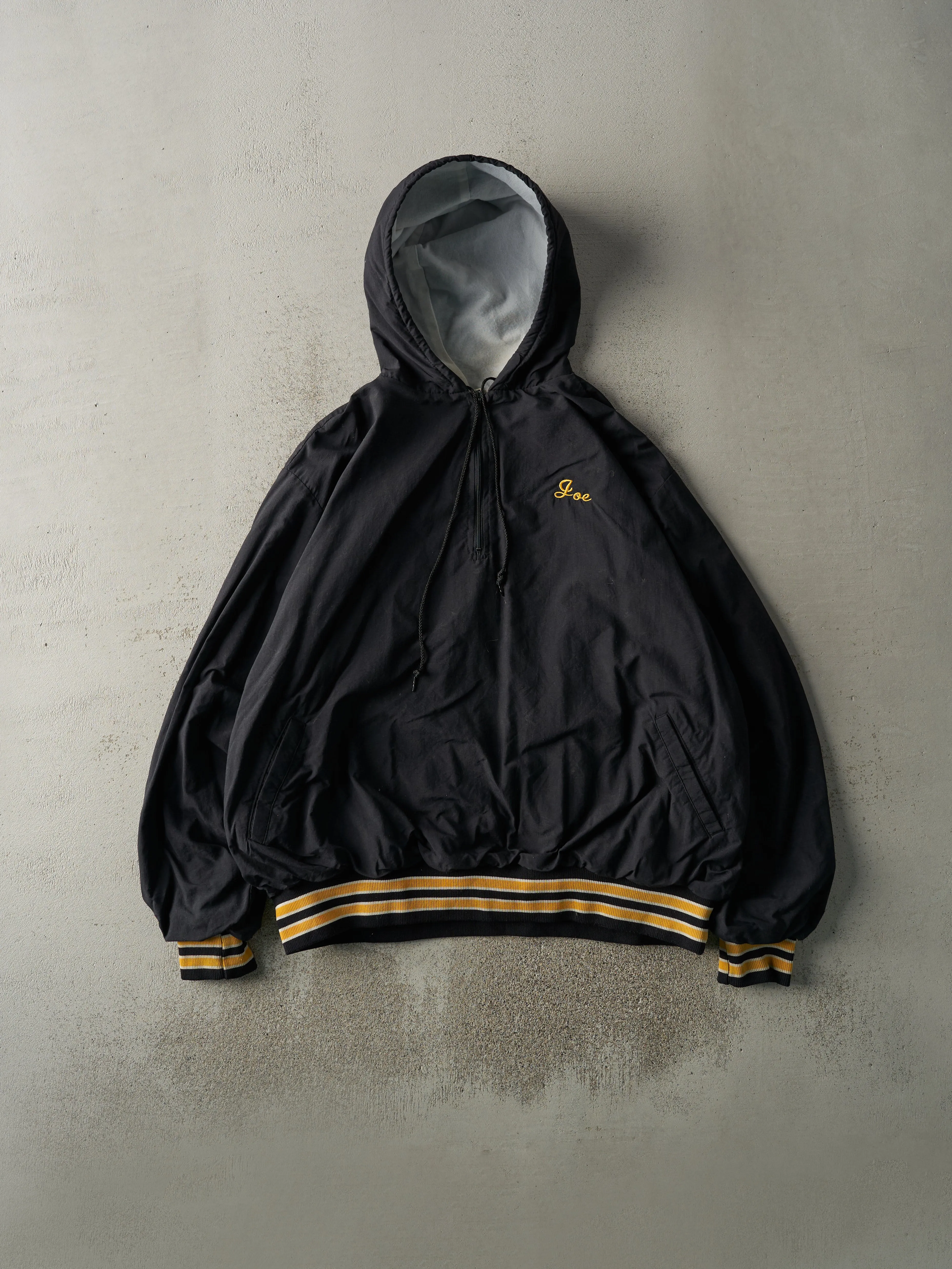 Vintage 90s Black & Yellow Quarter Zip Hooded Bomber Jacket (XXL) sold by Rebalance Vintage