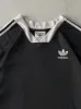 Vintage Y2K Black Embroidered Adidas Soccer Jersey (L) sold by Rebalance Vintage