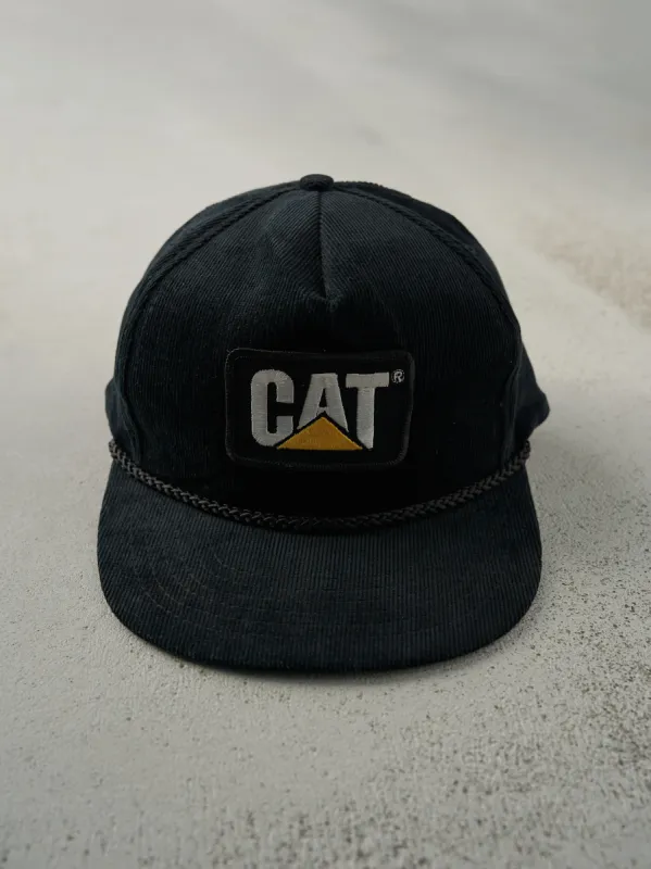 Vintage 90s Black CAT Corduroy Snapback Hat sold by Rebalance Vintage