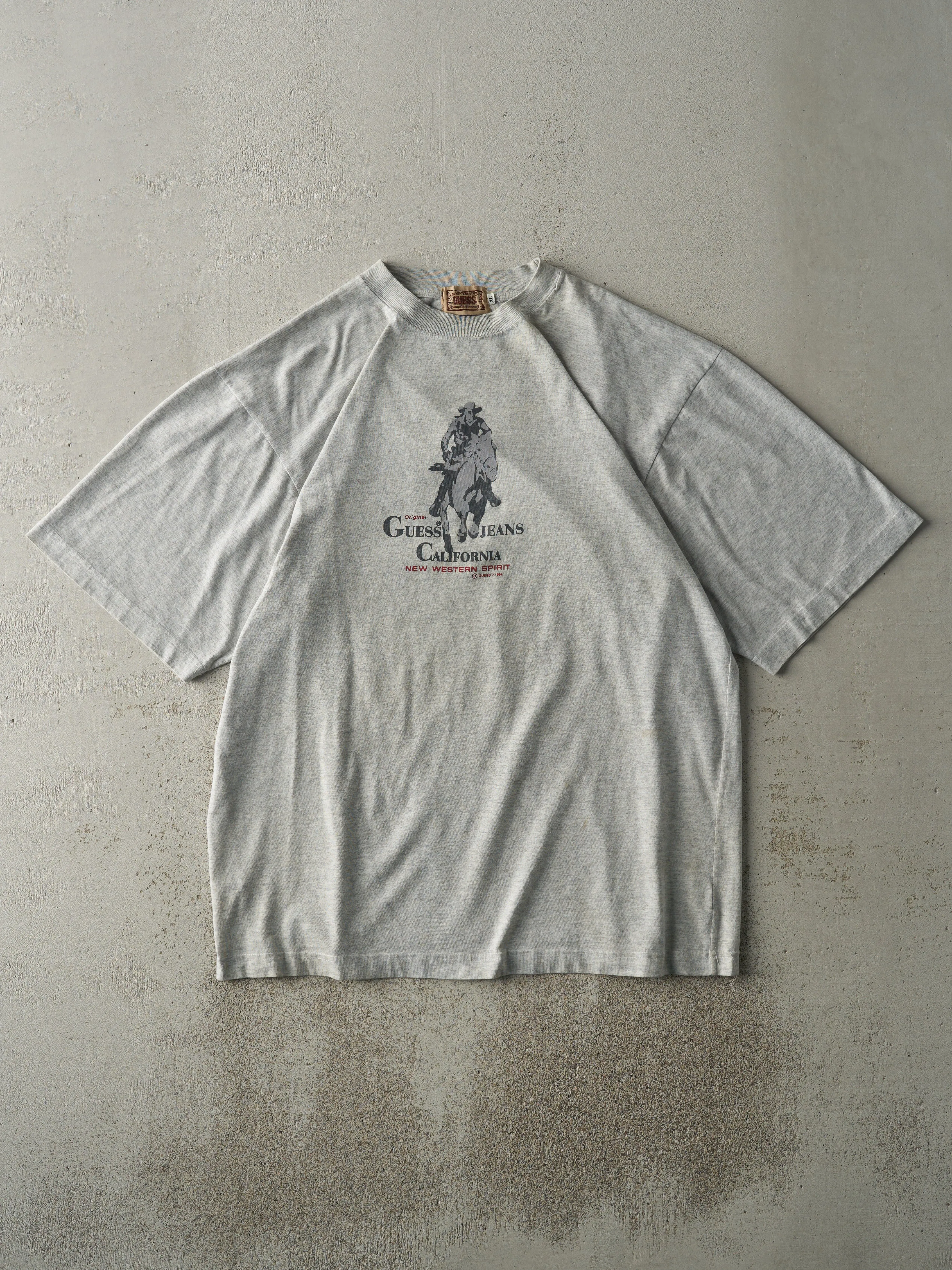Vintage 94' Grey Guess Jeans Logo Tee (XL) sold by Rebalance Vintage