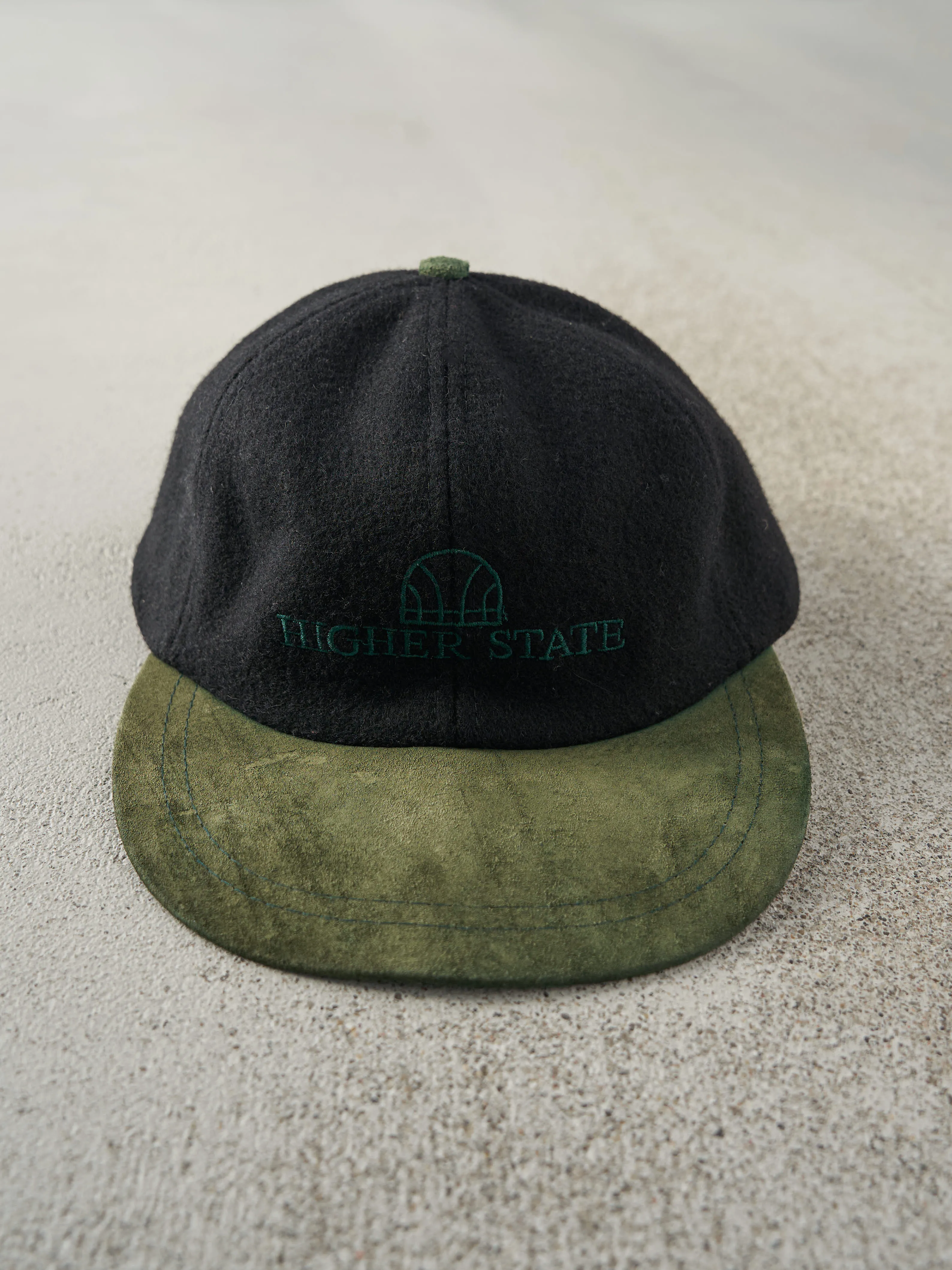 Vintage 90s Black & Green Embroidered Higher State Wool & Suede Leather Strap Back Hat sold by Rebalance Vintage