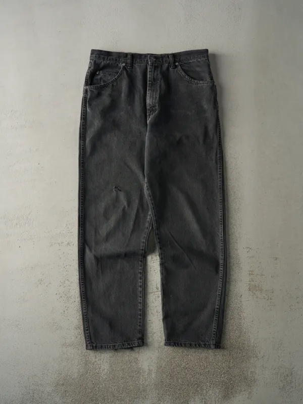 Vintage 90s Faded Black Wrangler Denim Pants (34x31.5) sold by Rebalance Vintage