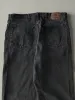 Vintage 90s Faded Black Wrangler Denim Pants (34x31.5) sold by Rebalance Vintage