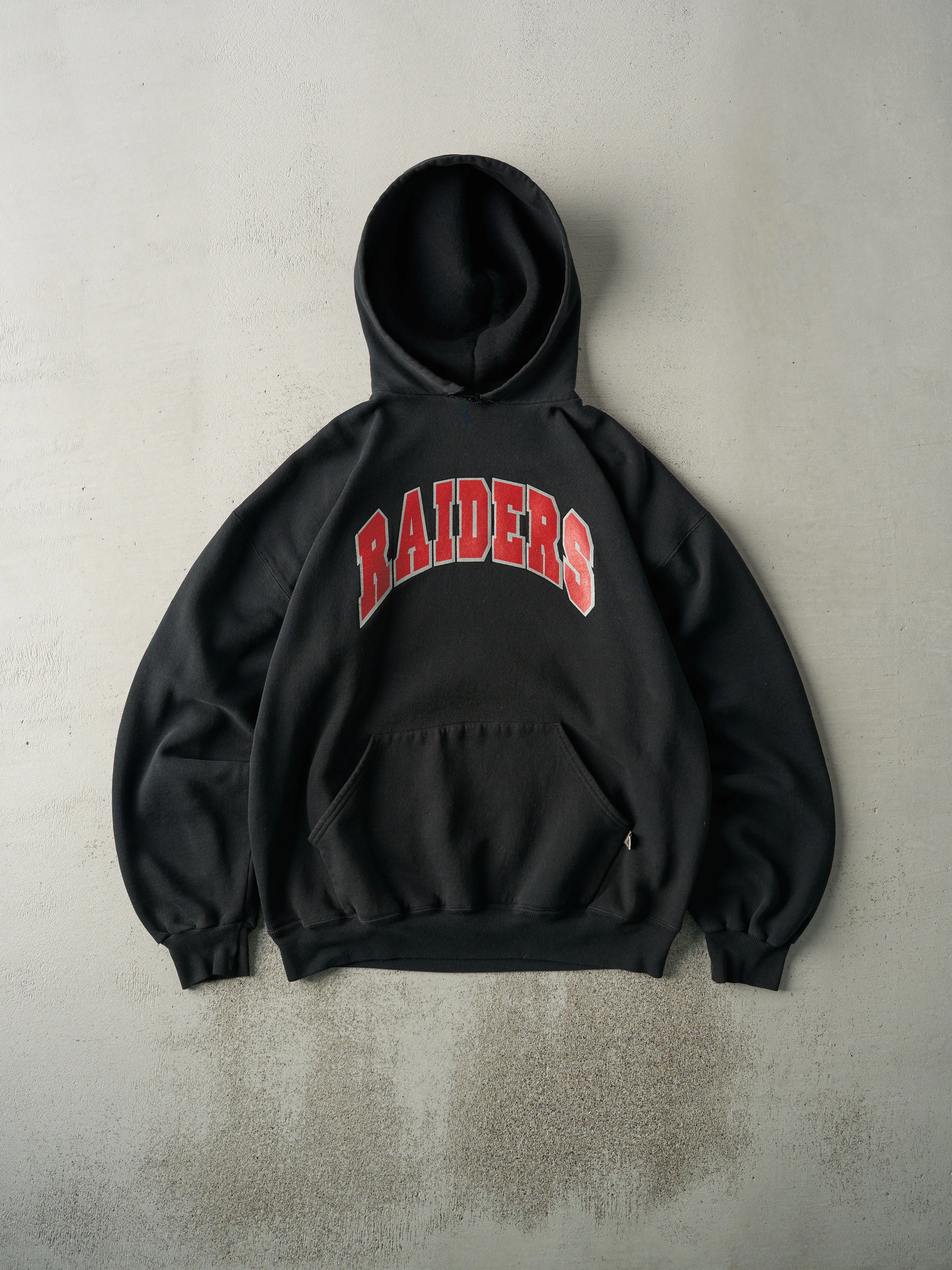 Vintage 90s Black Russell Athletic Raiders Hoodie (L) sold by Rebalance Vintage