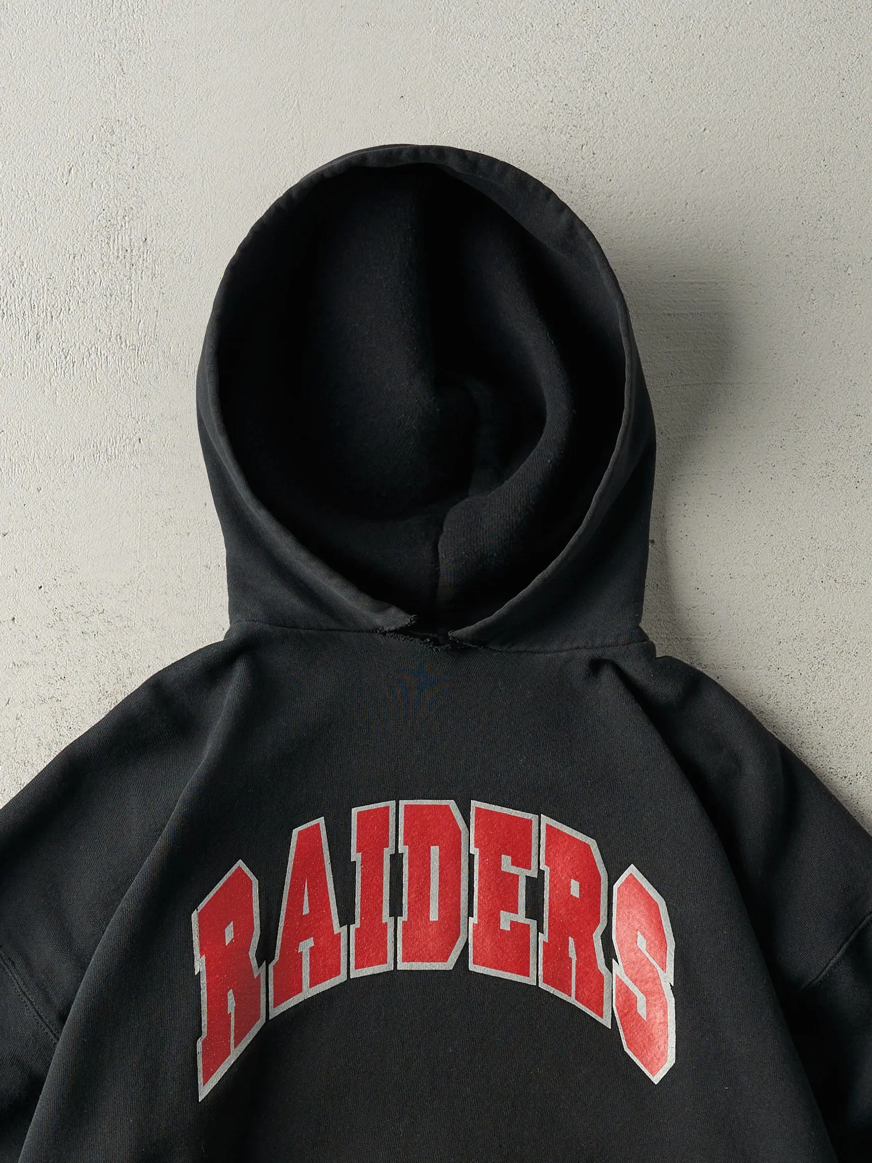 Vintage 90s Black Russell Athletic Raiders Hoodie (L) sold by Rebalance Vintage product image thumbnail 2