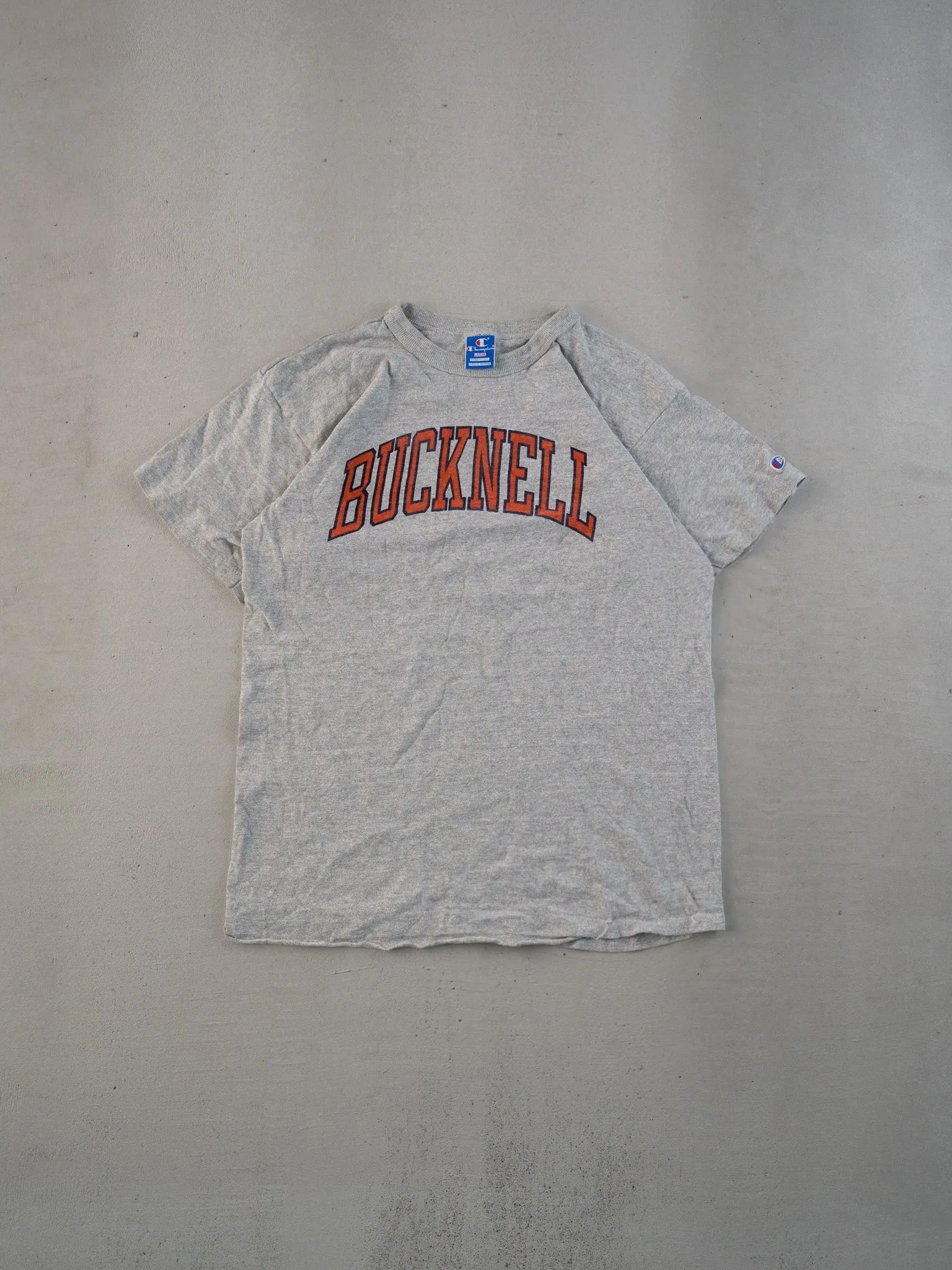 Vintage 80s Grey Bucknell Graphic Tee (S) sold by Rebalance Vintage