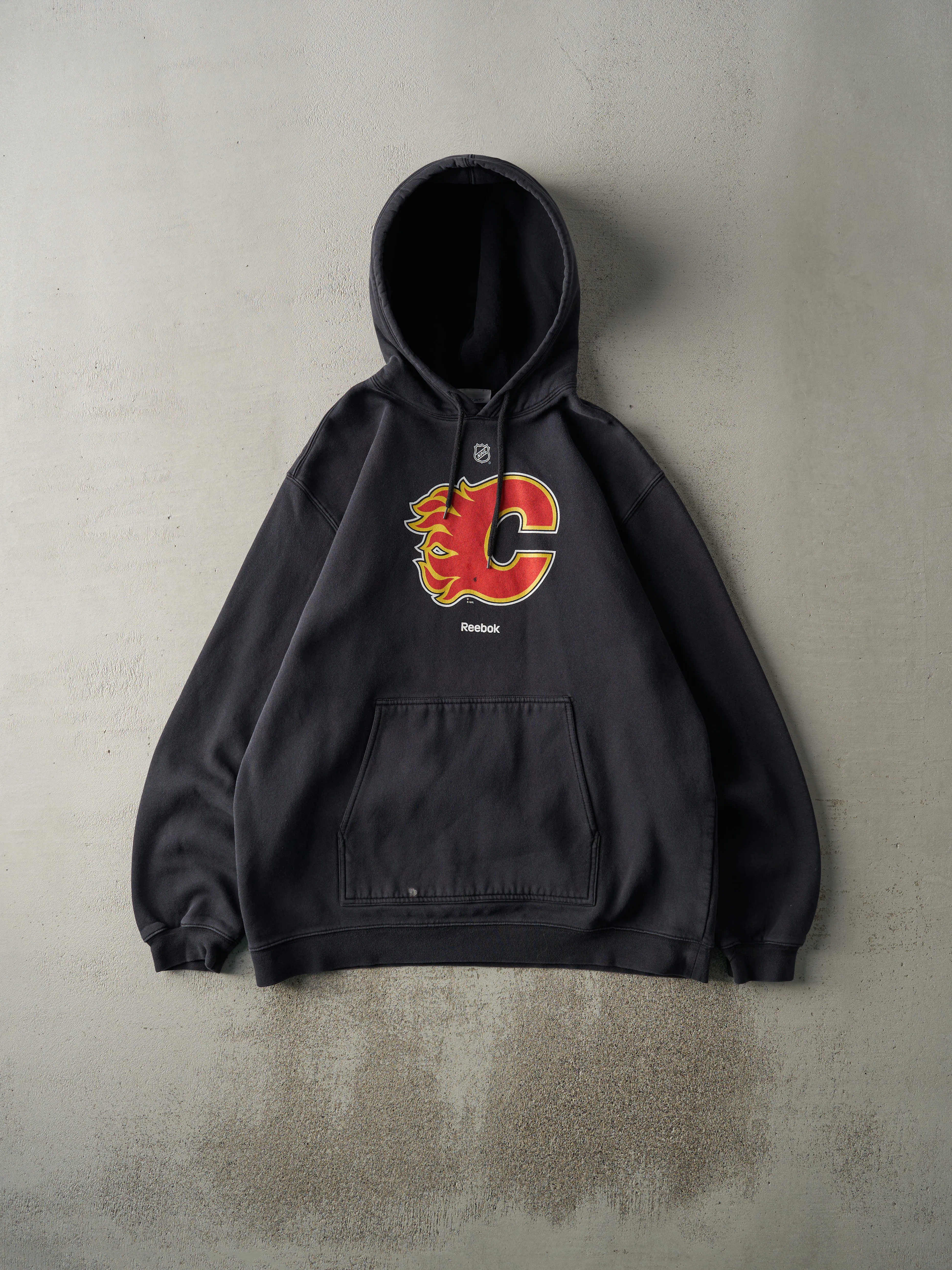 Vintage Y2K Black Calgary Flames Reebok Hoodie (XL) sold by Rebalance Vintage