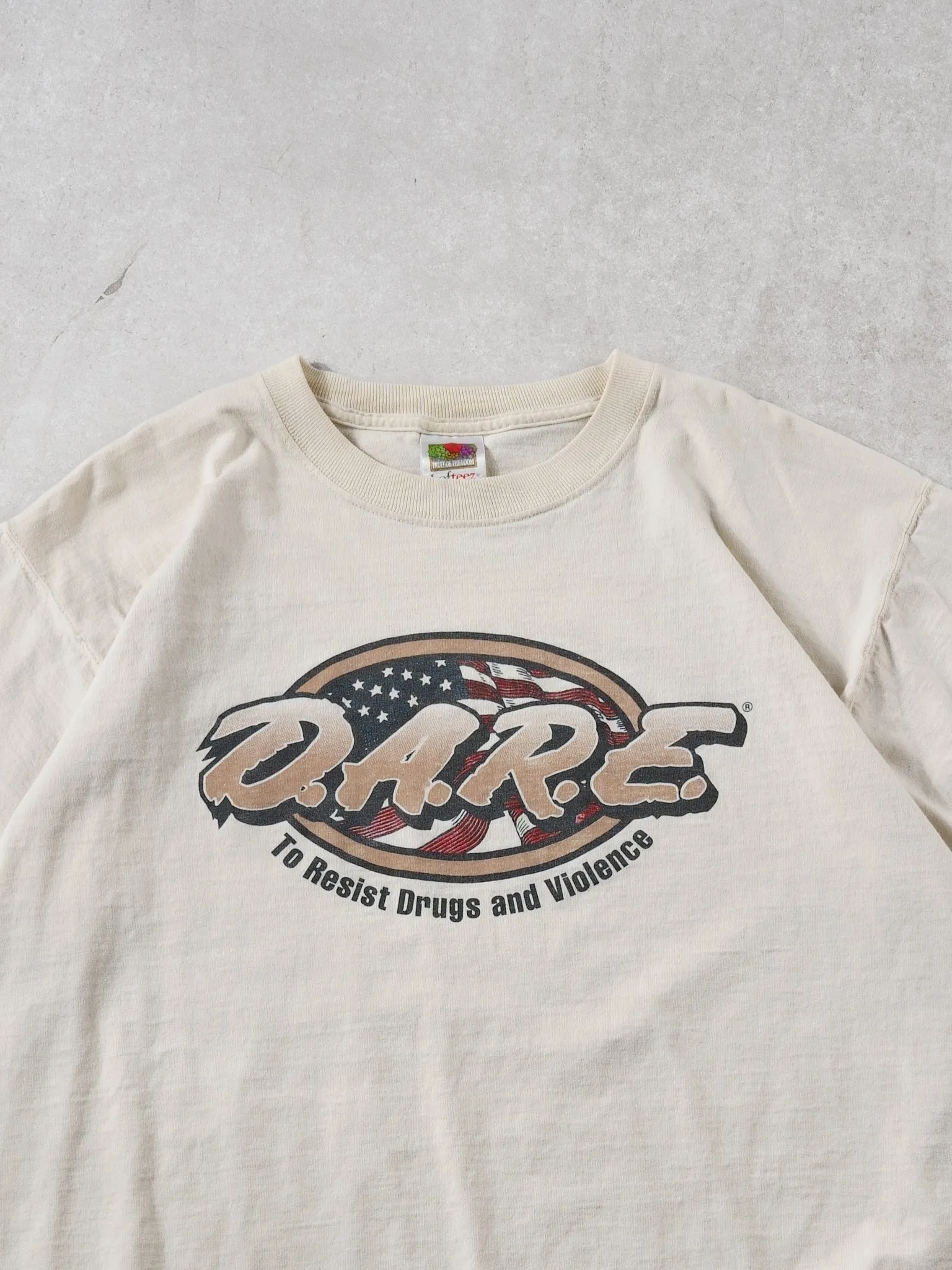 Vintage 90 Beige "DARE" America Graphic Tee (L) sold by Rebalance Vintage product image thumbnail 2